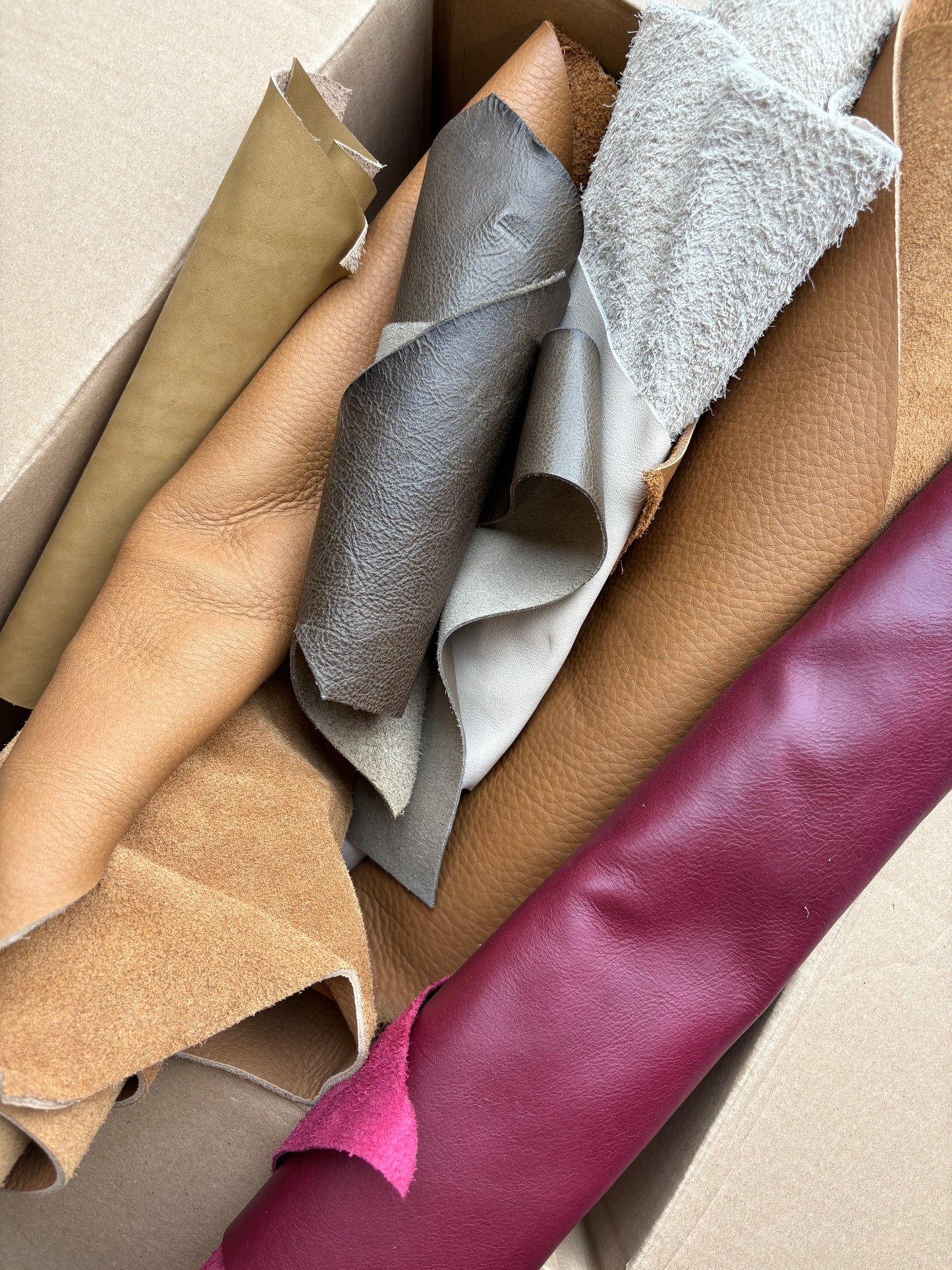 Collection of colourful leather in various sizes 
