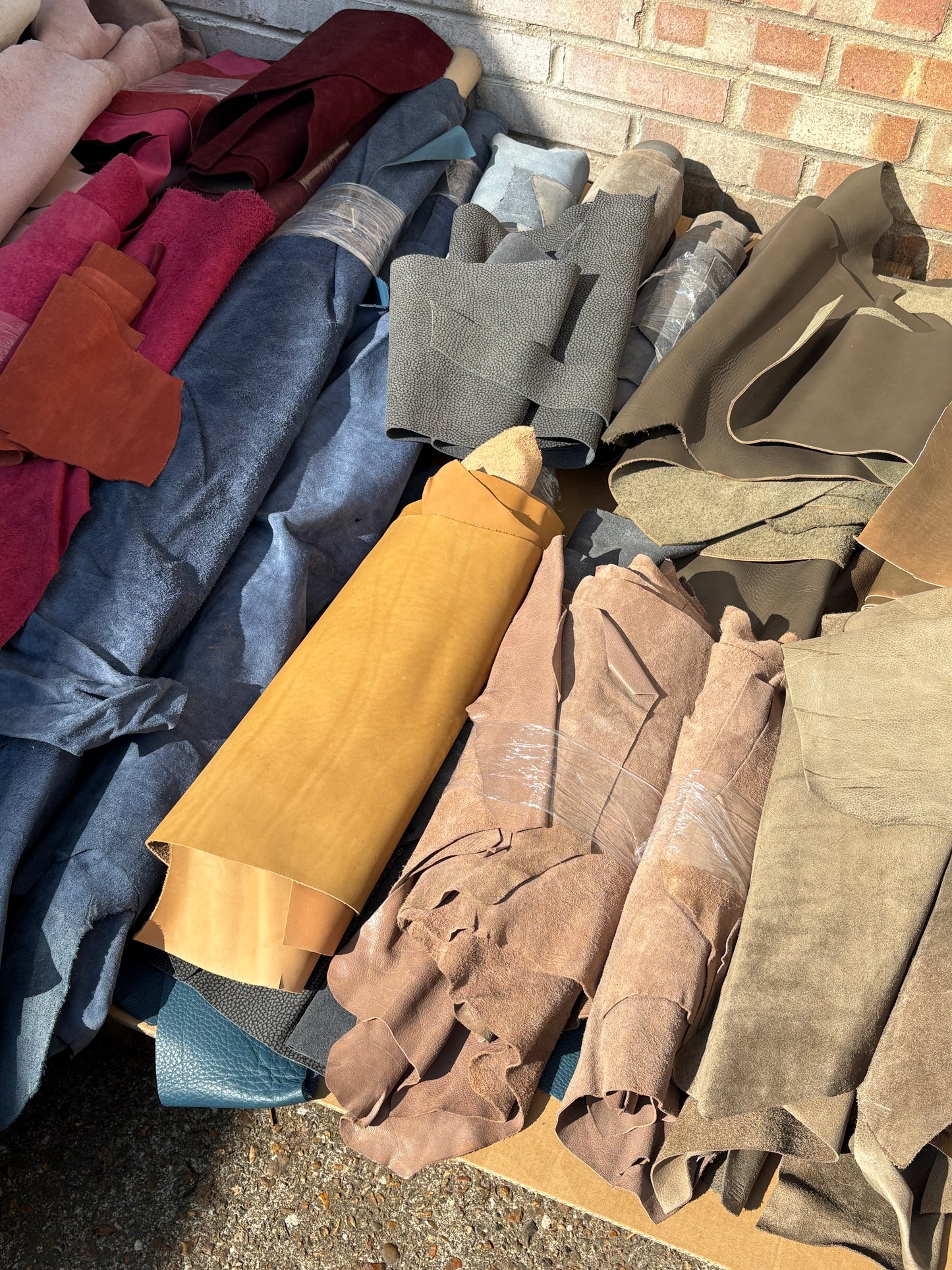 Collection of colourful leather in various sizes 