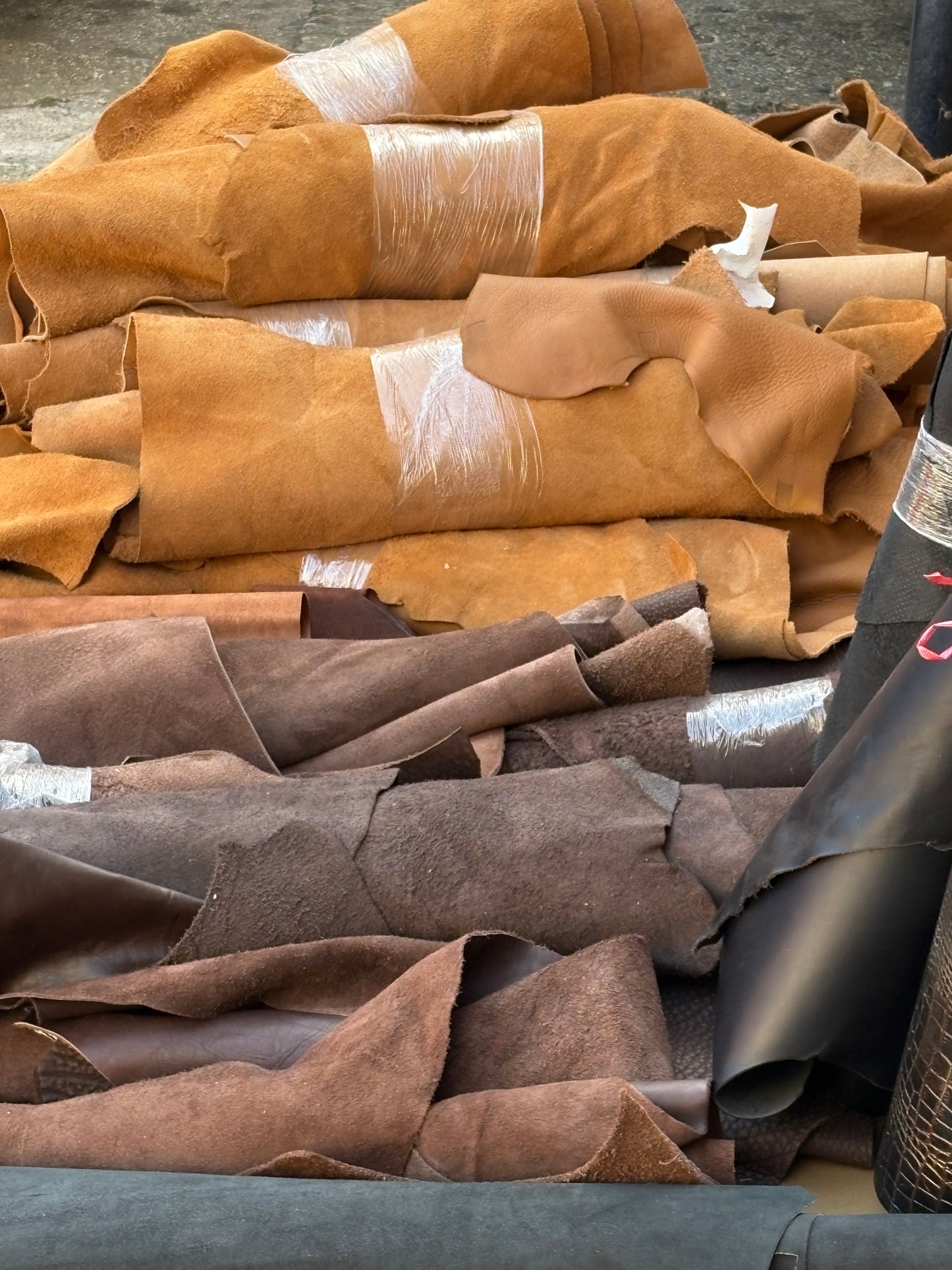 Collection of colourful leather in various sizes 