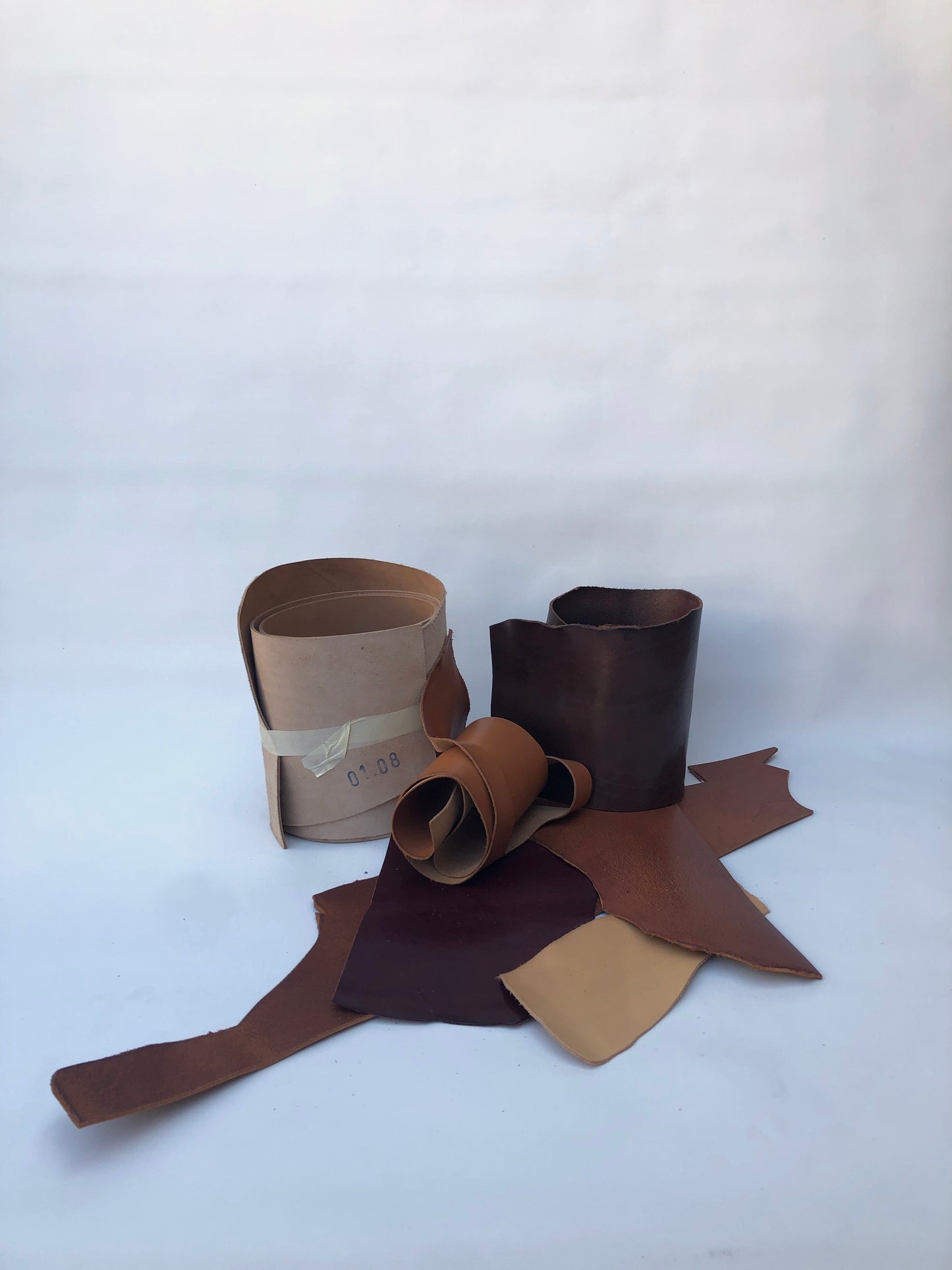 Collection of brown leather offcuts in various sizes 