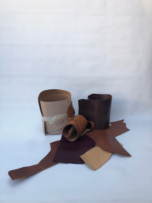 Collection of brown leather offcuts in various sizes 