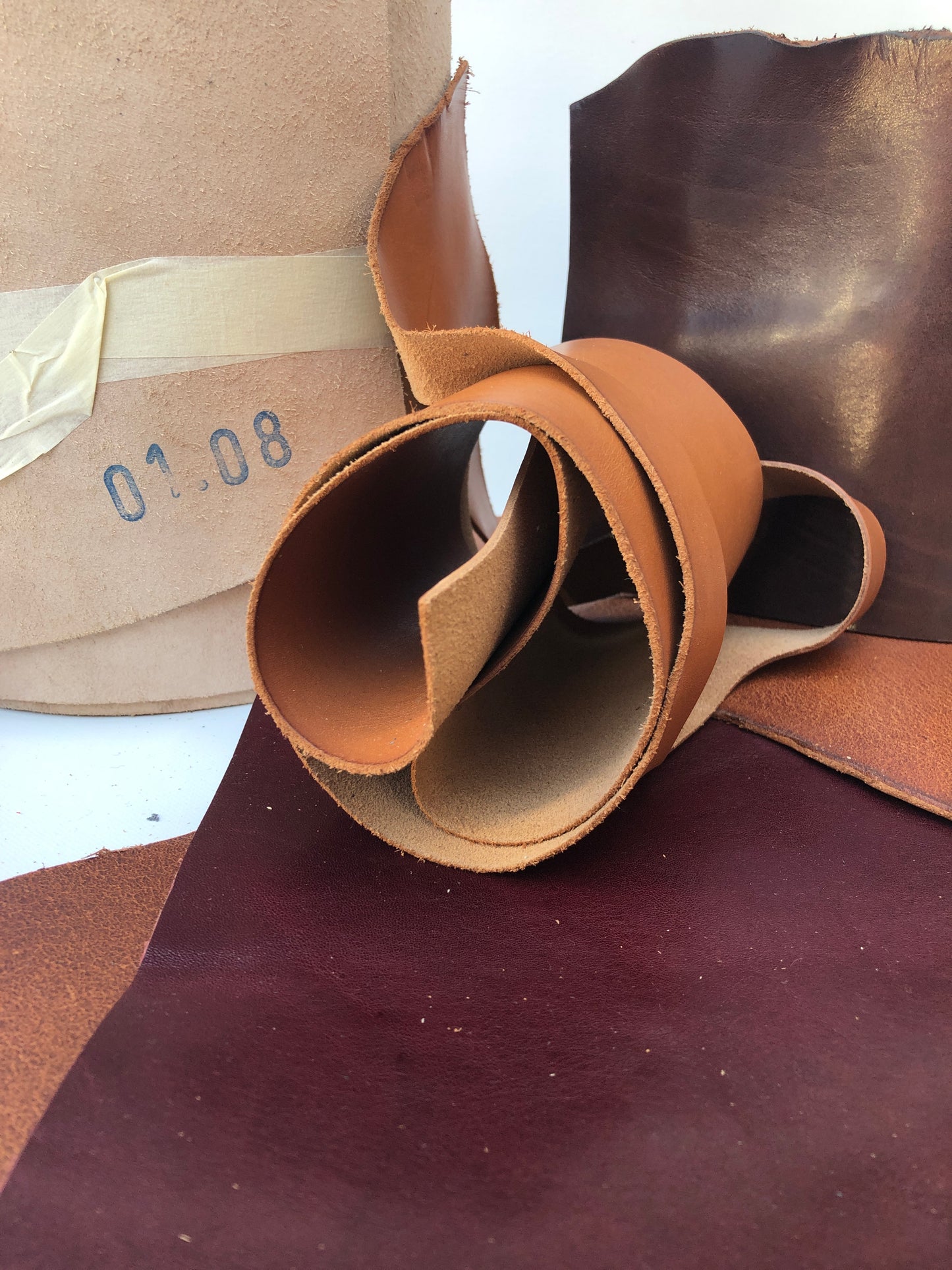 Collection of brown leather offcuts in various sizes 