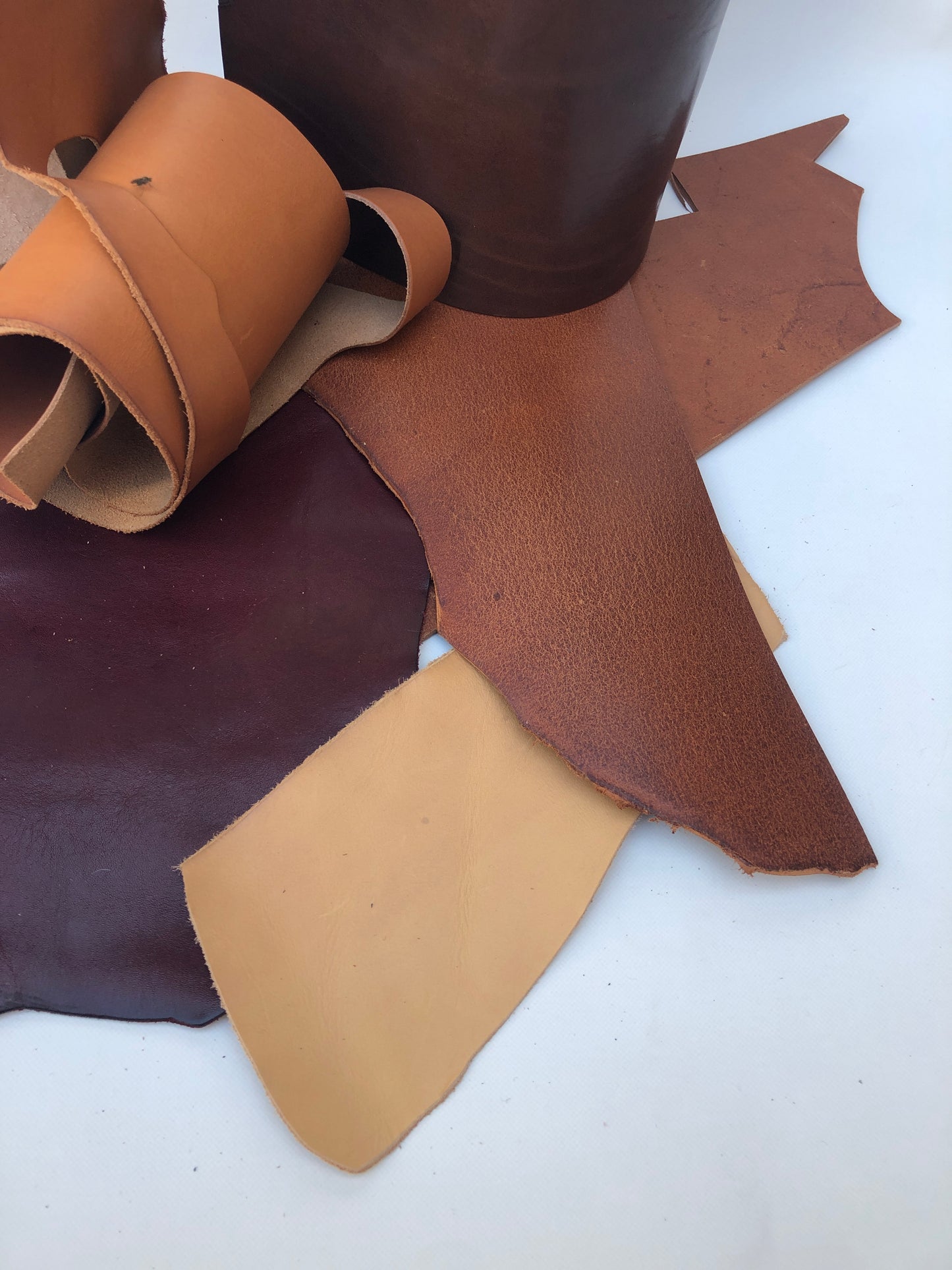 Collection of brown leather offcuts in various sizes 