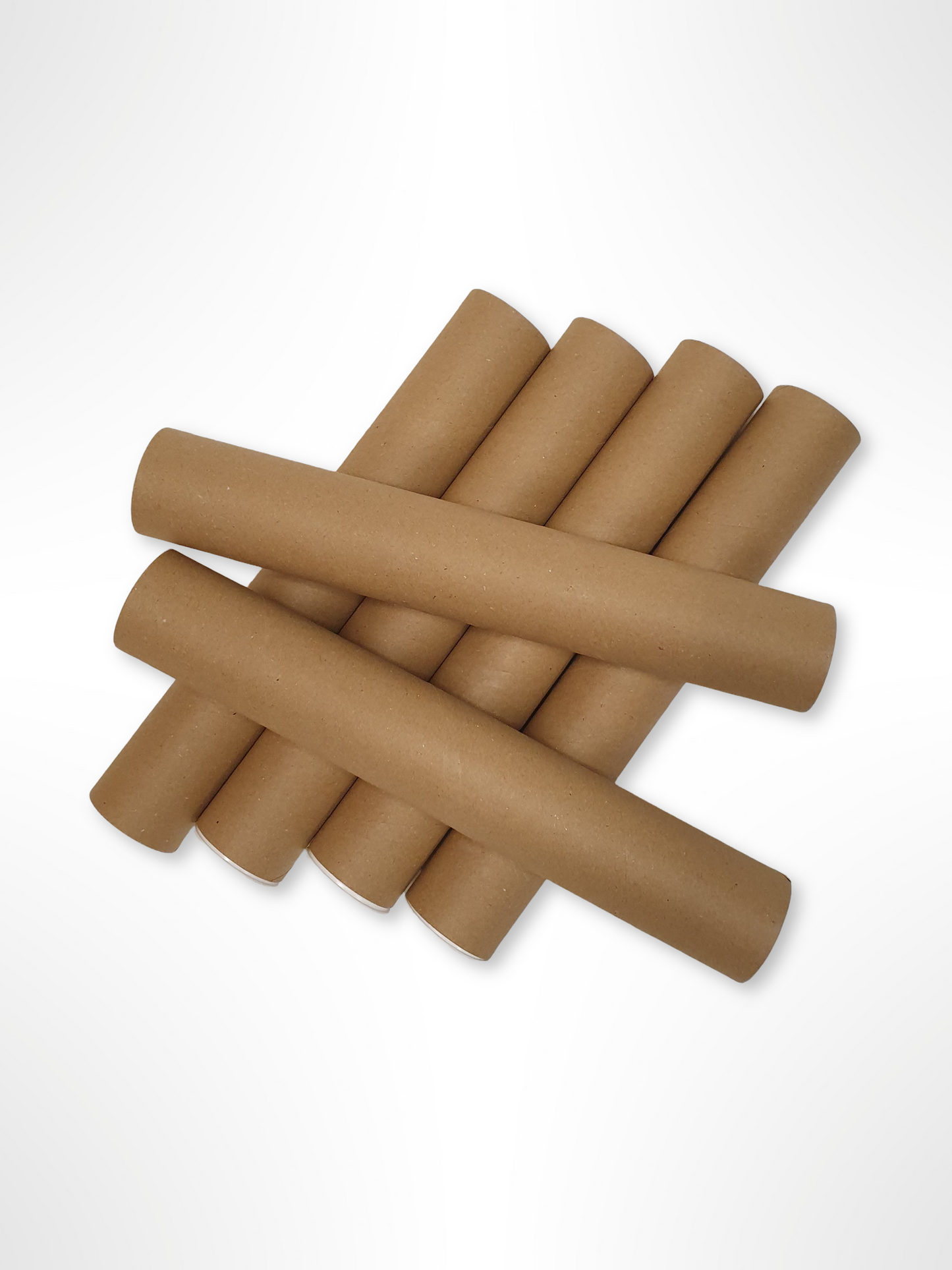A top view of the pile of brown cardboard packing tubes.