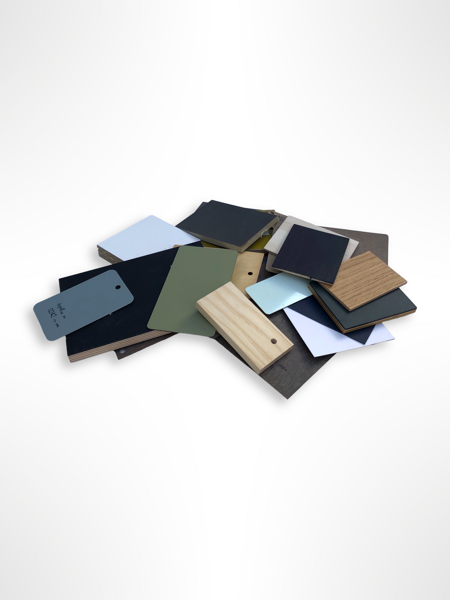 Stack of colour-coated wood samples in various sizes 