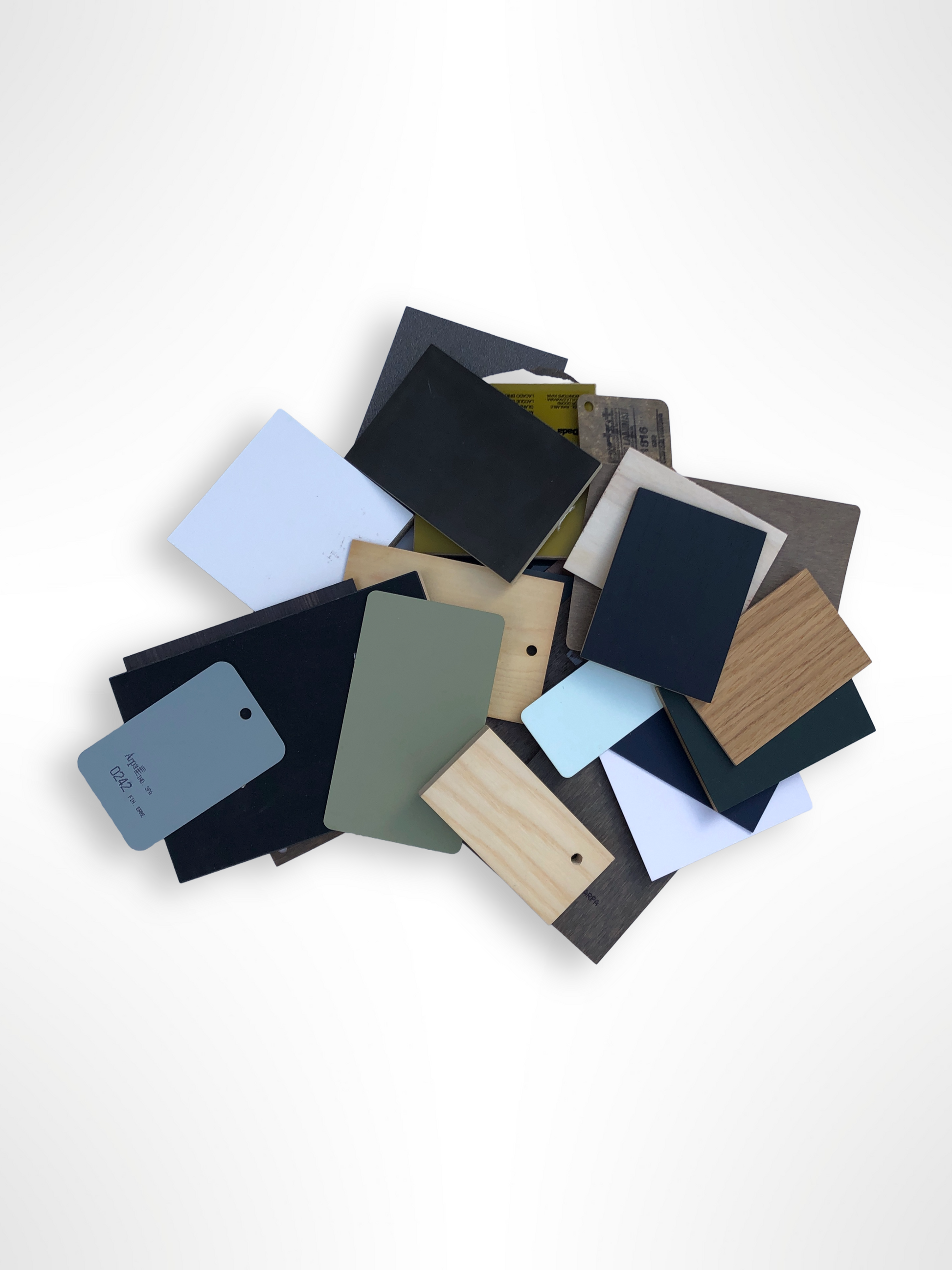Stack of colour-coated wood samples in various sizes 