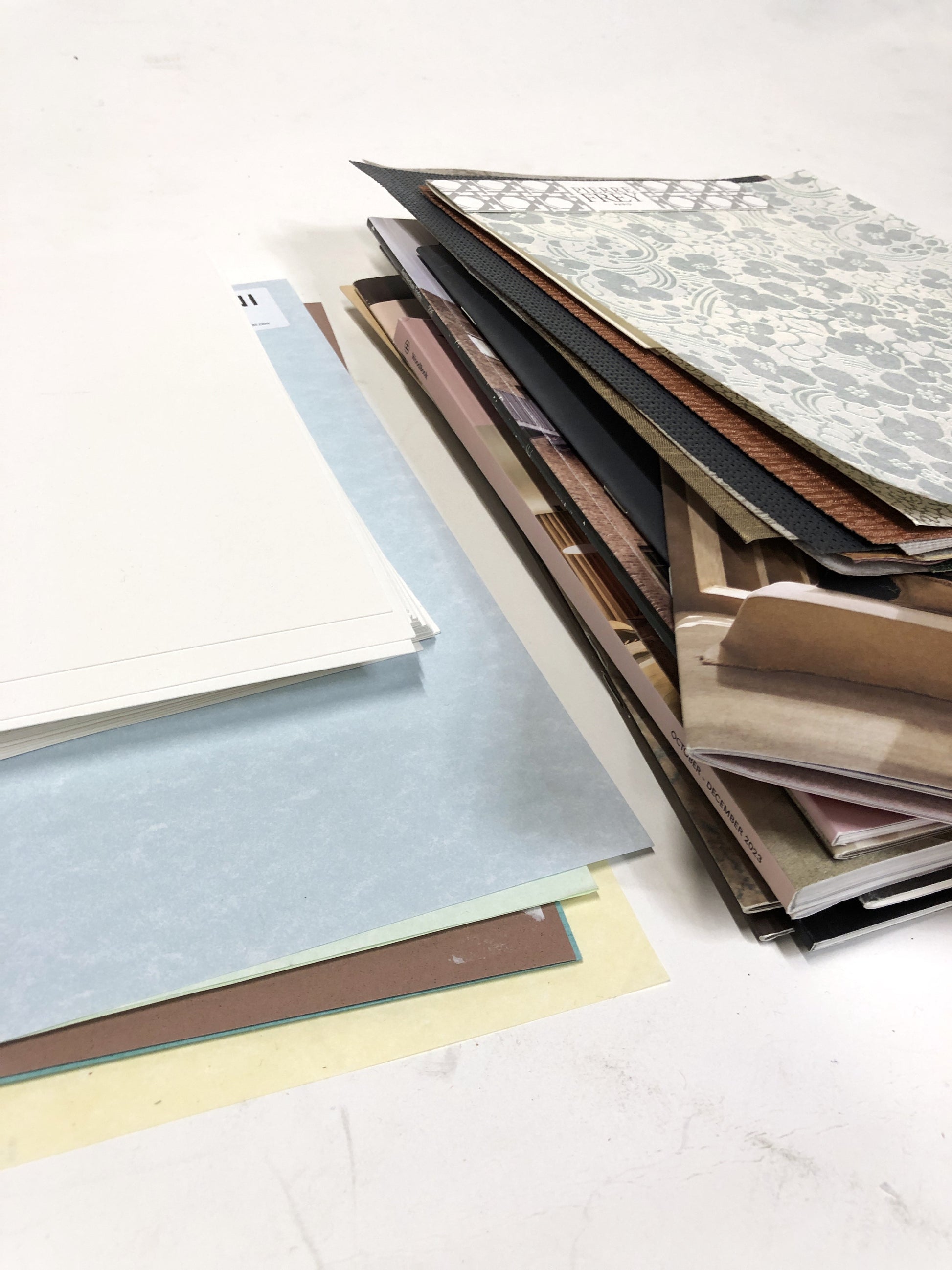 Collection of greeting card-making kits, including magazine scraps