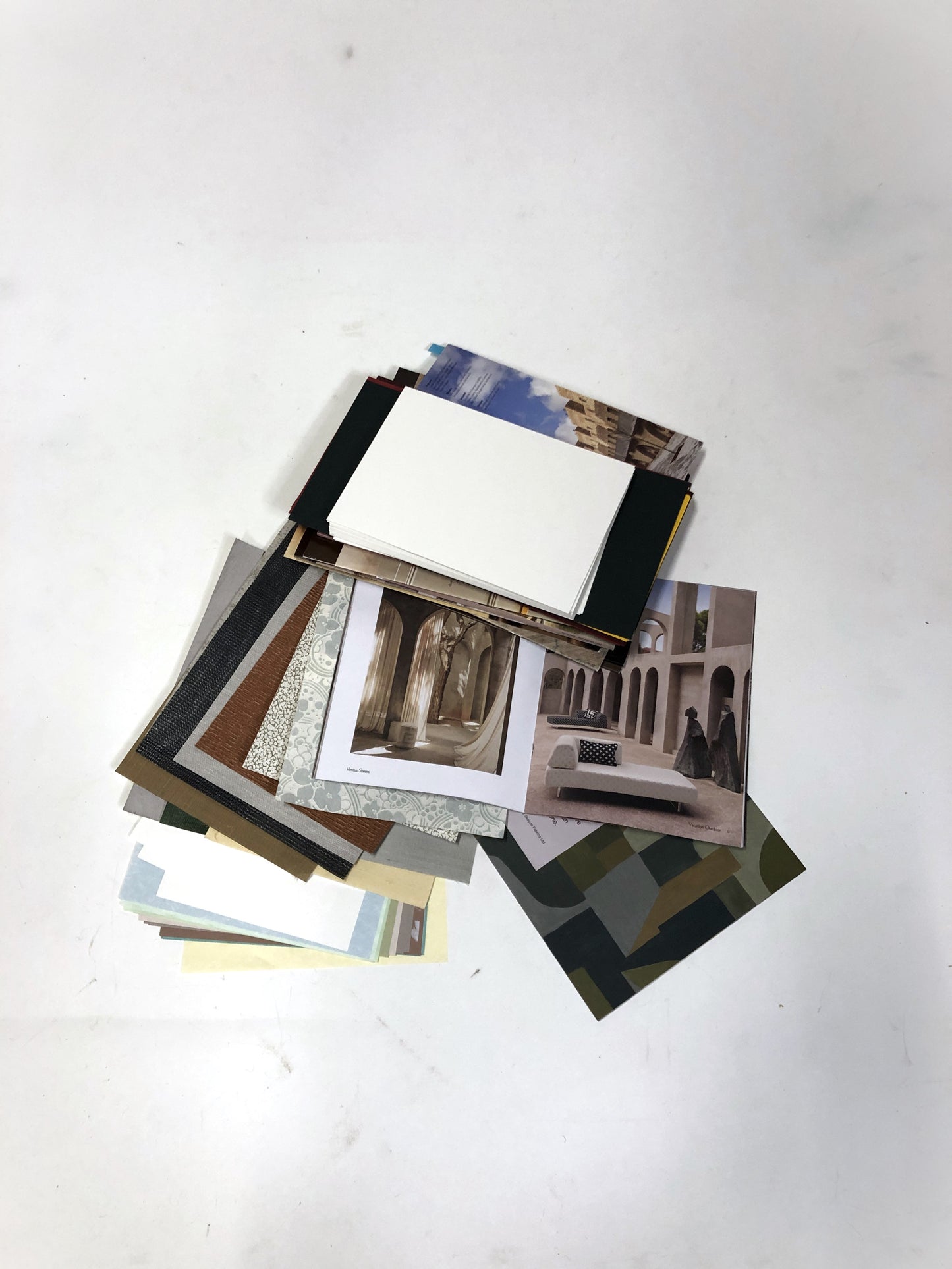 Collection of greeting card-making kits, including magazine scraps