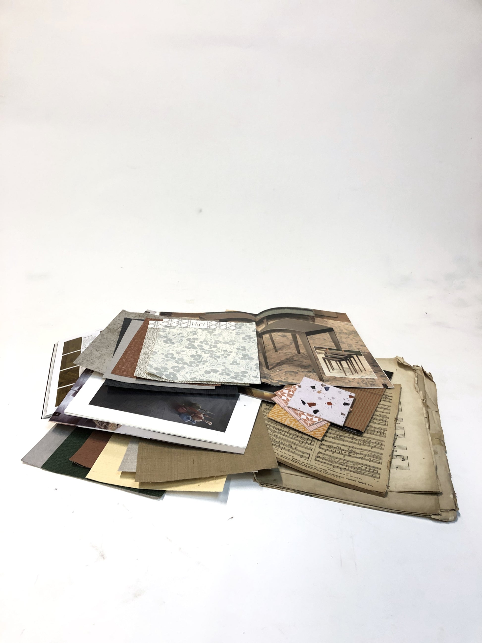 Collection of scrapbooking collage-making kits, including magazine scraps