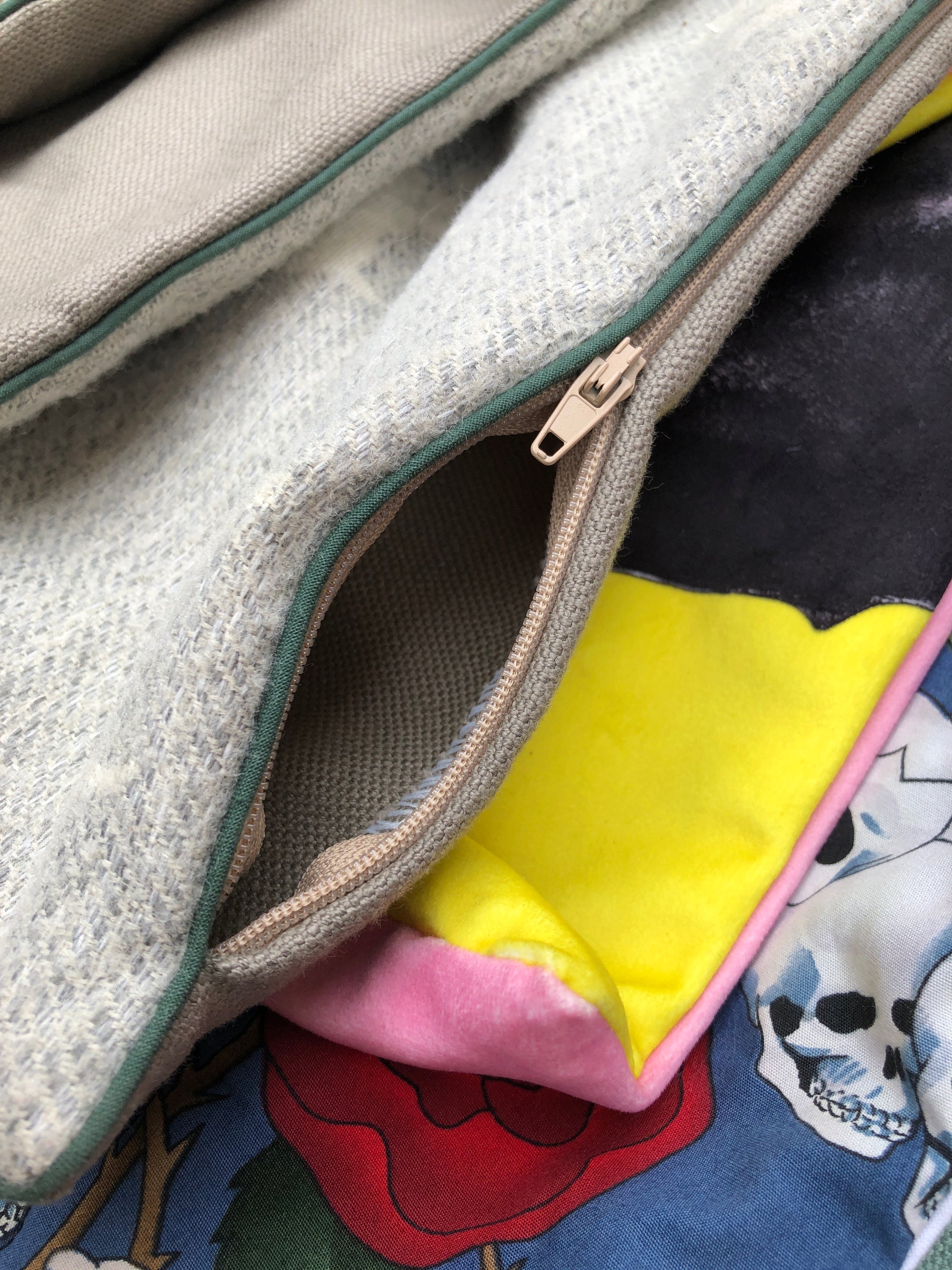 Close-up of cushion cover with a zipper