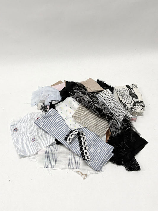 Collection of decorative lace fabric offcuts in various colours 