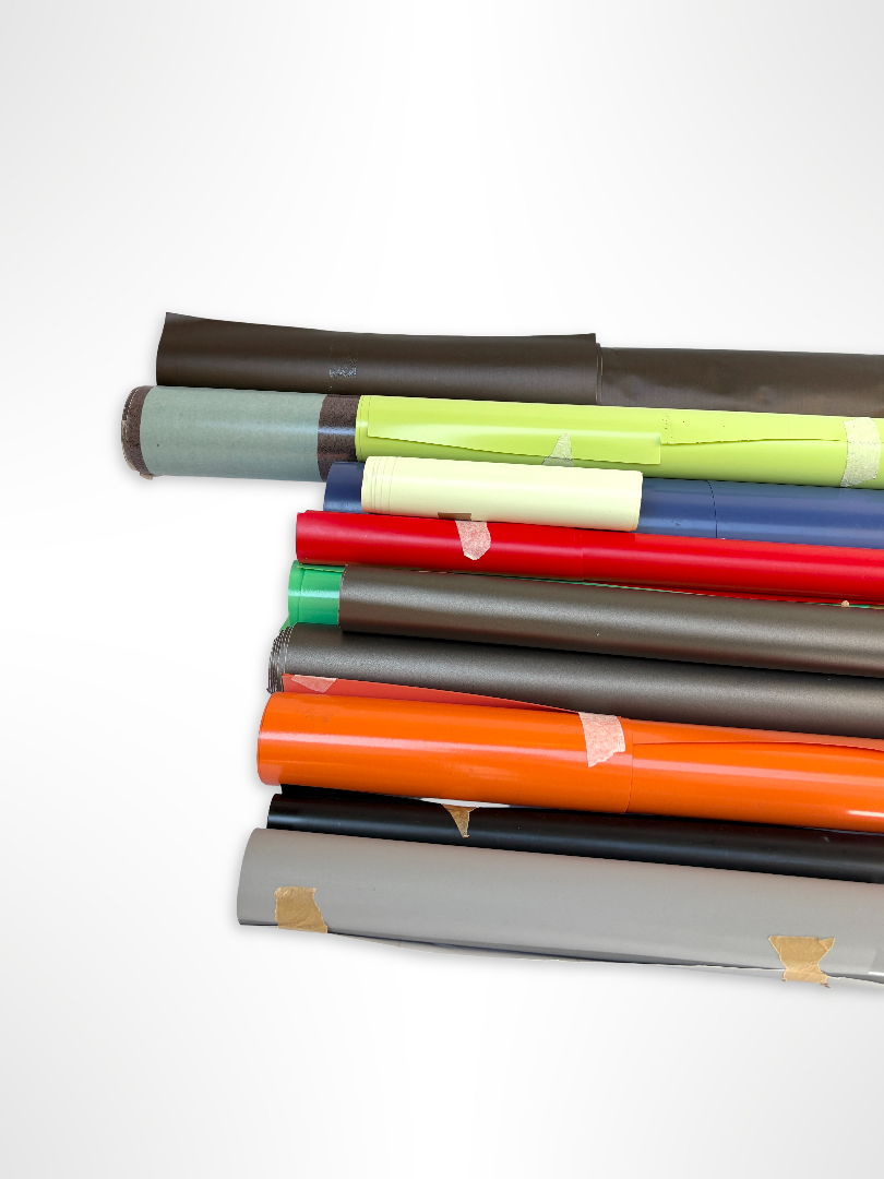 Collection of decorative paper vinyl rolls which are self-adhesive, in various colours 