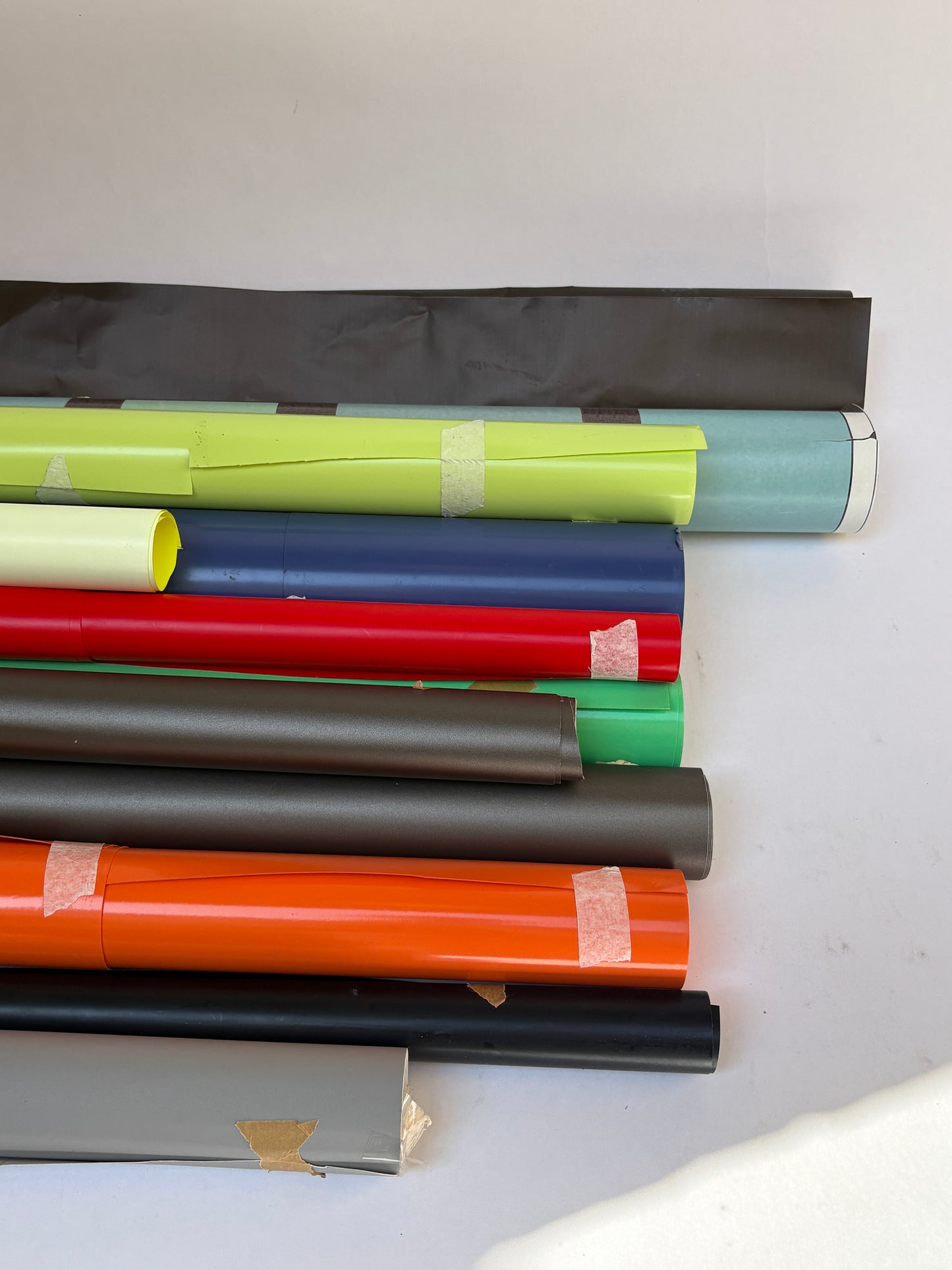 Collection of decorative paper vinyl rolls which are self-adhesive, in various colours and sizes 