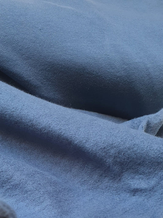 Close-up of brushed jersey fabric in blue