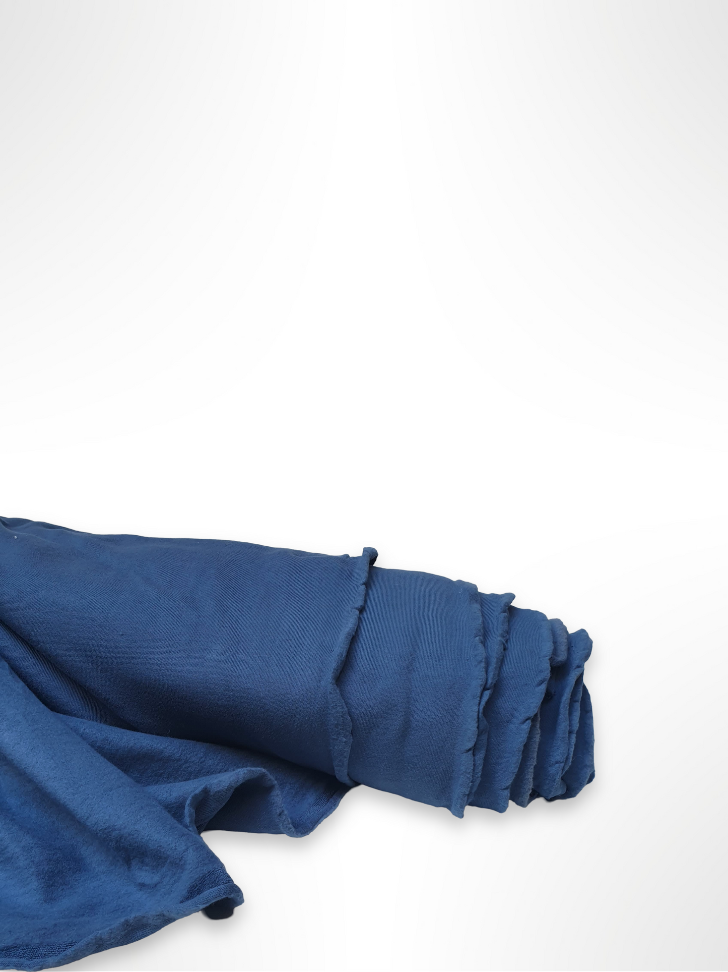 Roll of brushed jersey fabric in blue