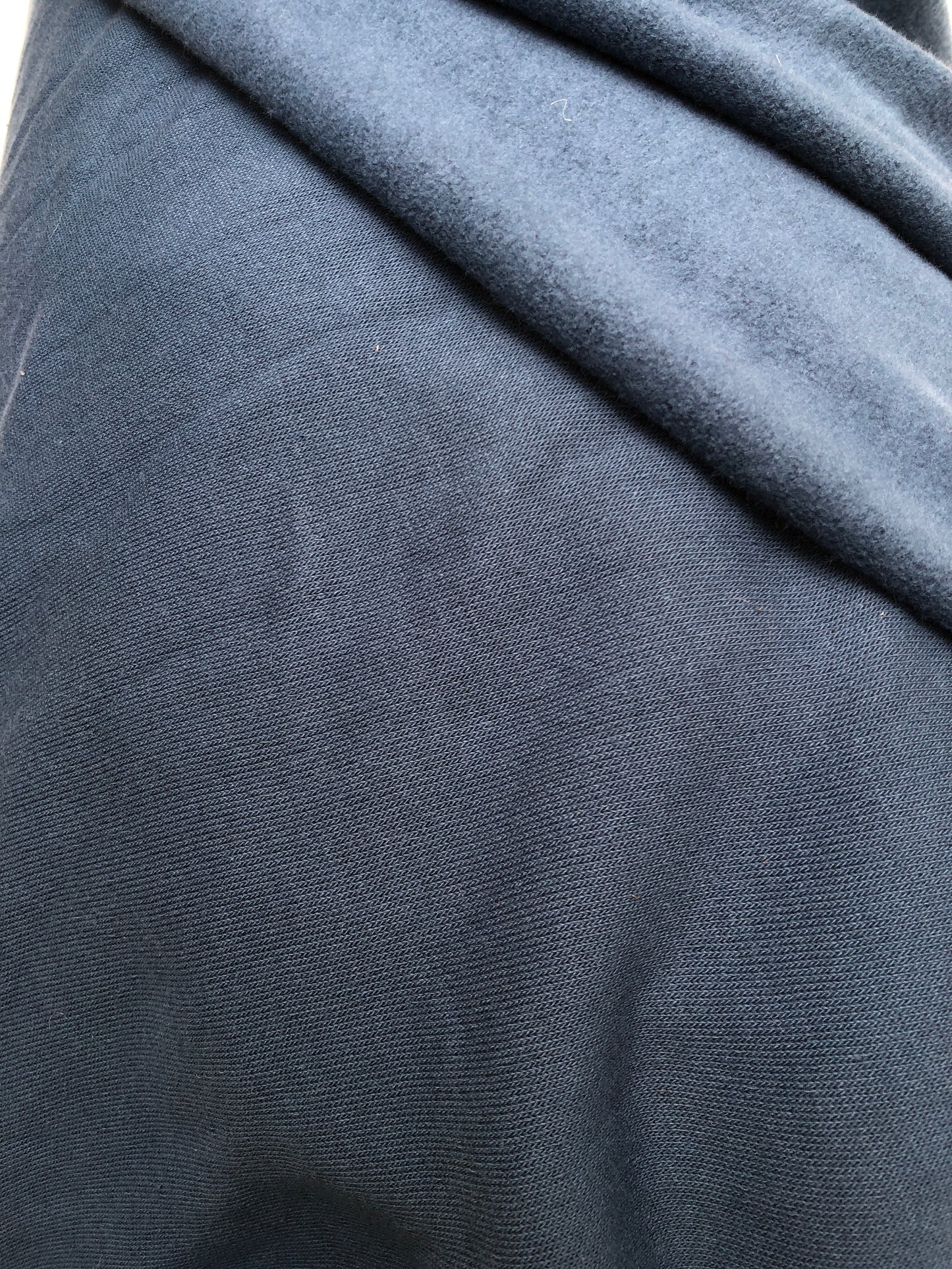 Close-up of brushed jersey fabric in blue