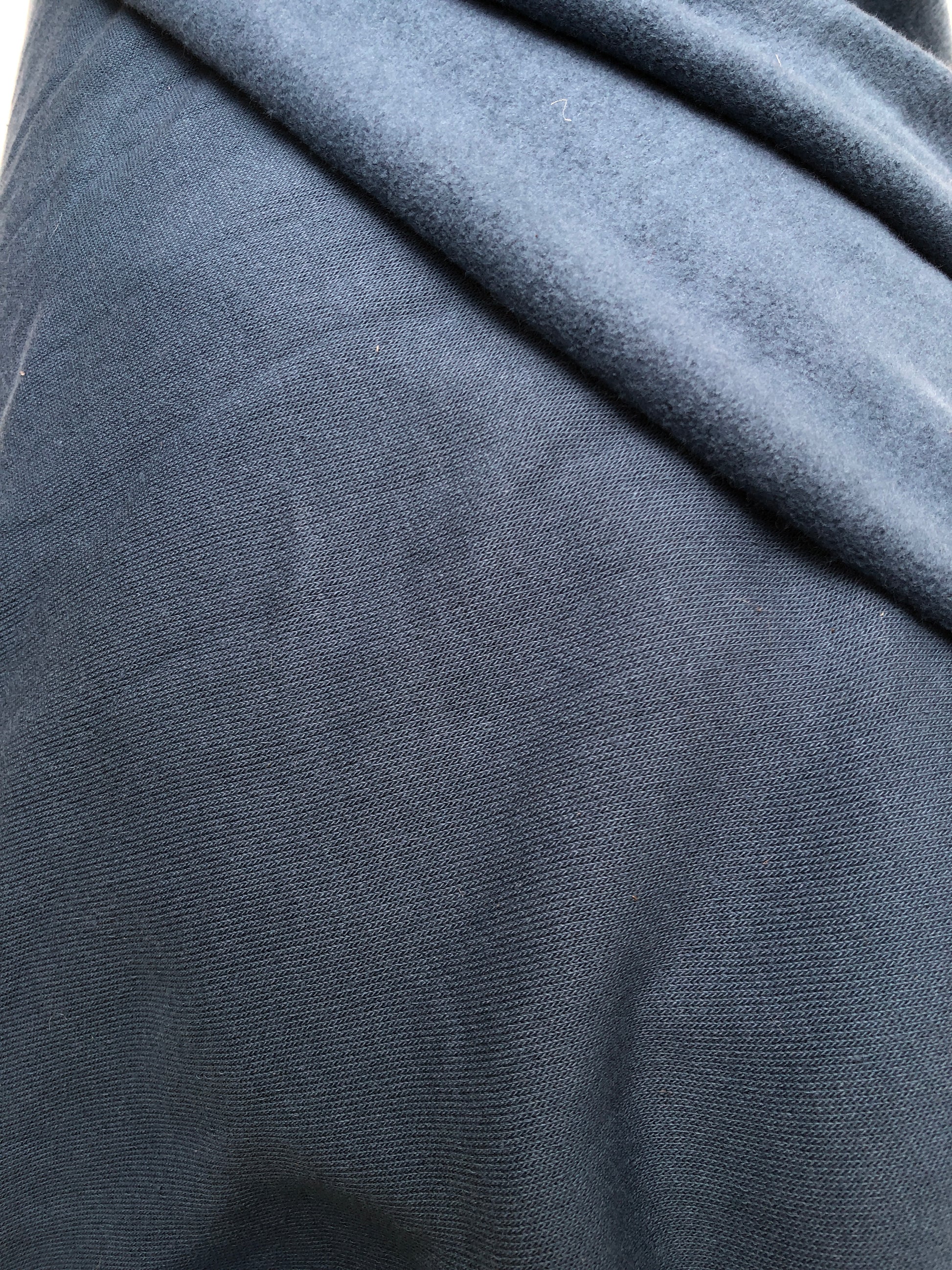 Close-up of brushed jersey fabric in blue
