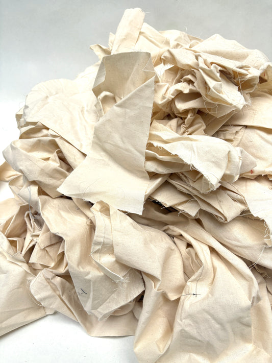 Stack of canvas offcuts fabric in white