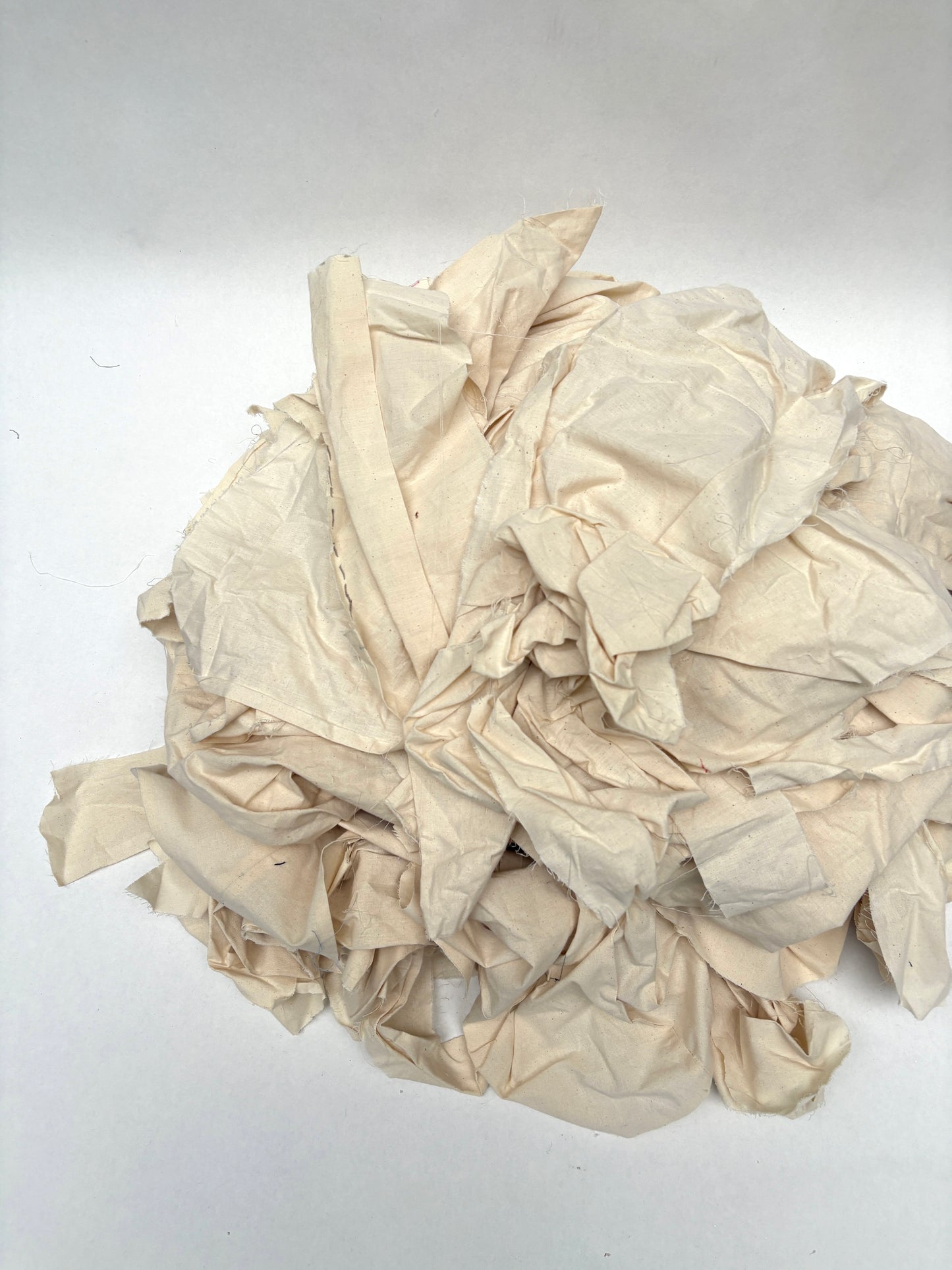 Stack of canvas offcuts fabric in white