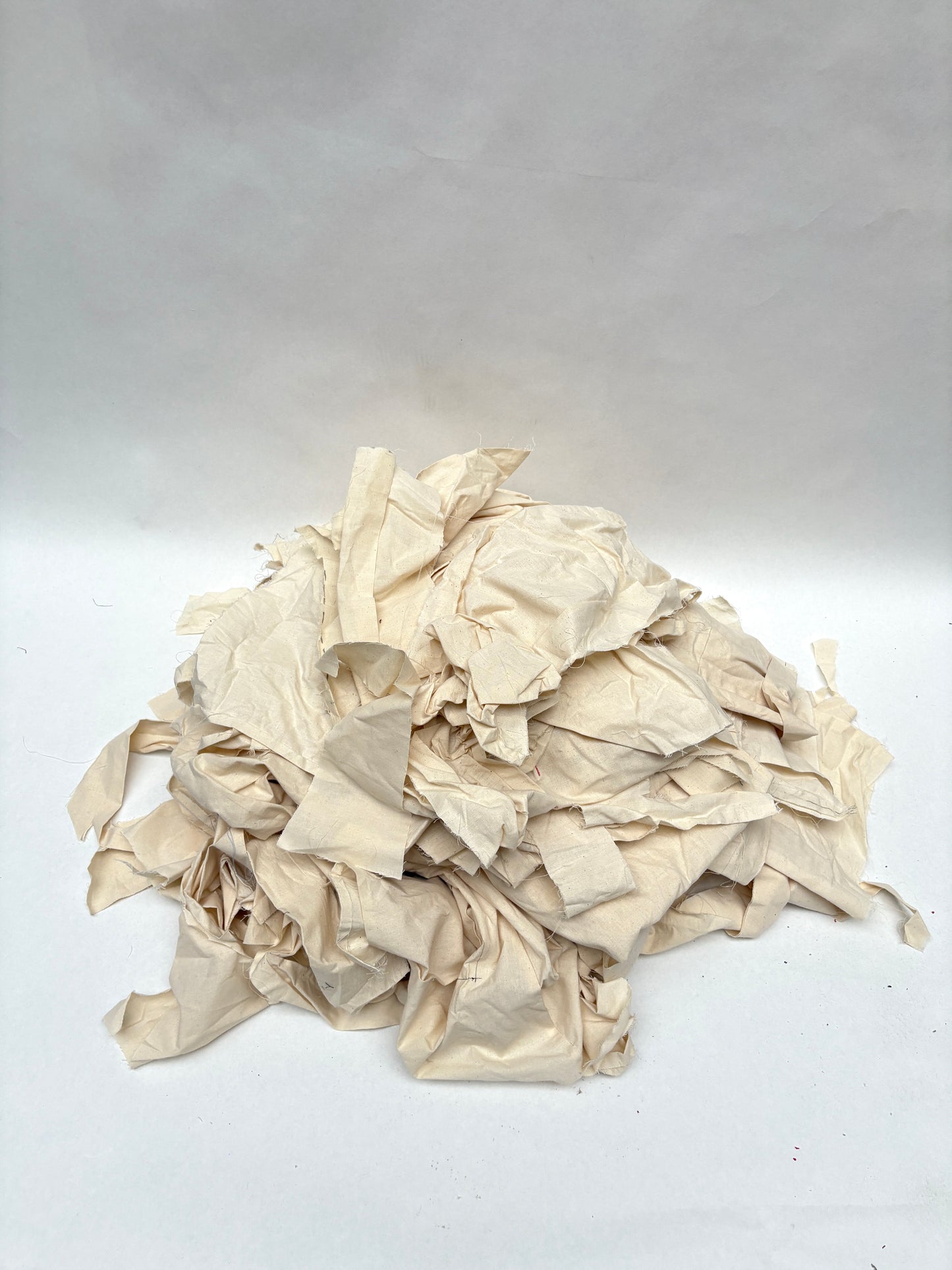 Stack of canvas offcuts fabric in white