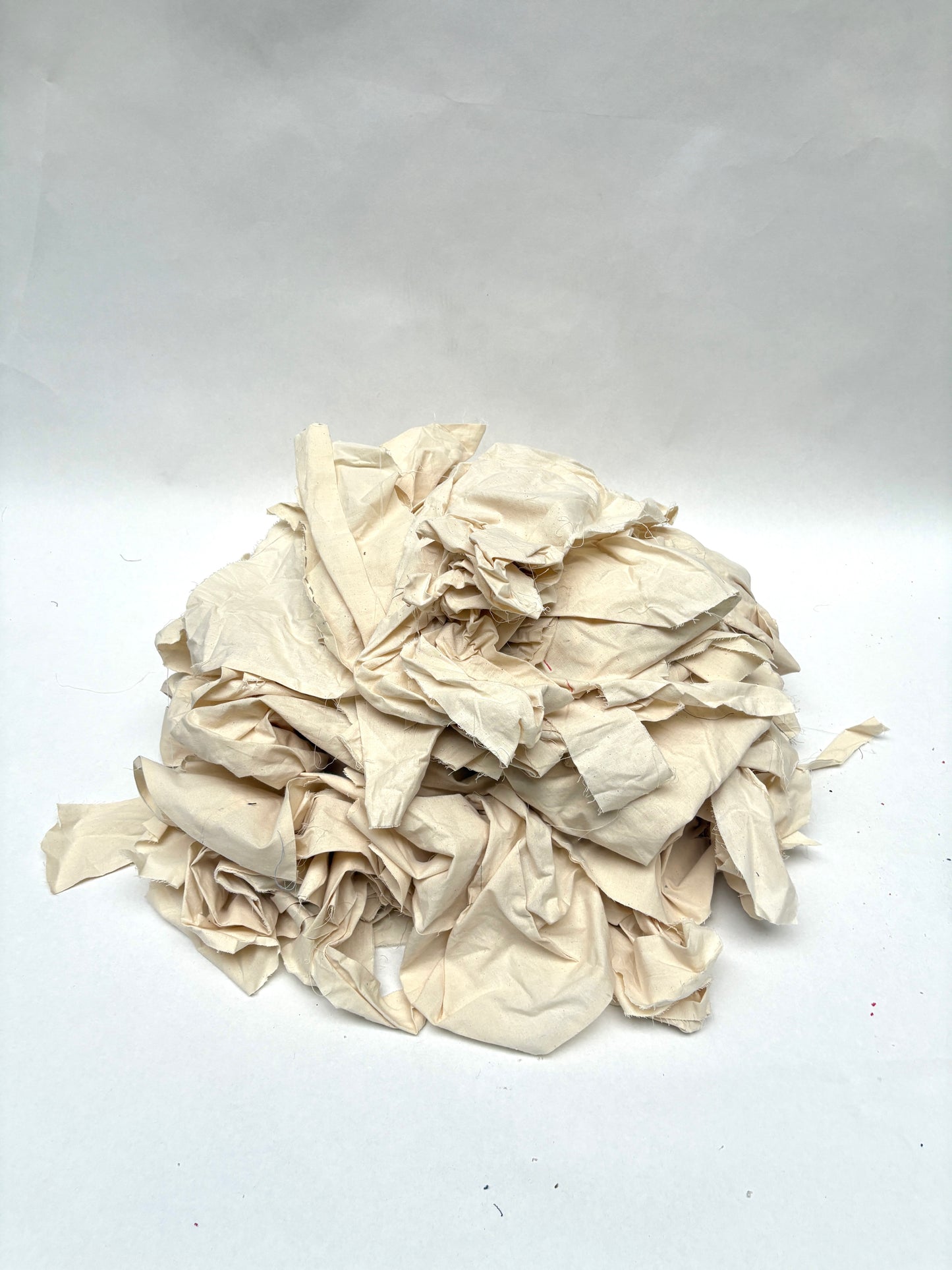 Stack of canvas offcuts fabric in white