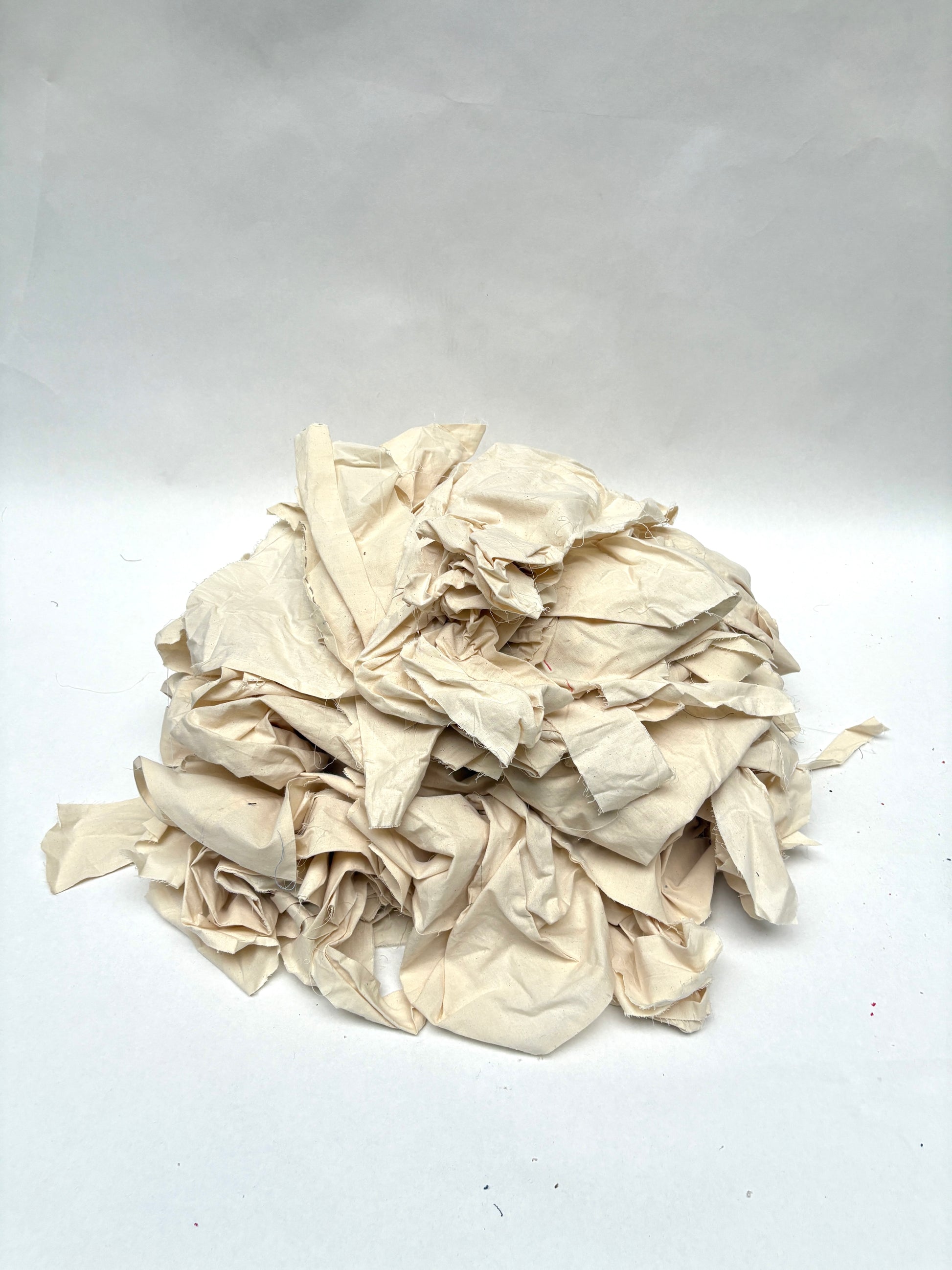 Stack of canvas offcuts fabric in white