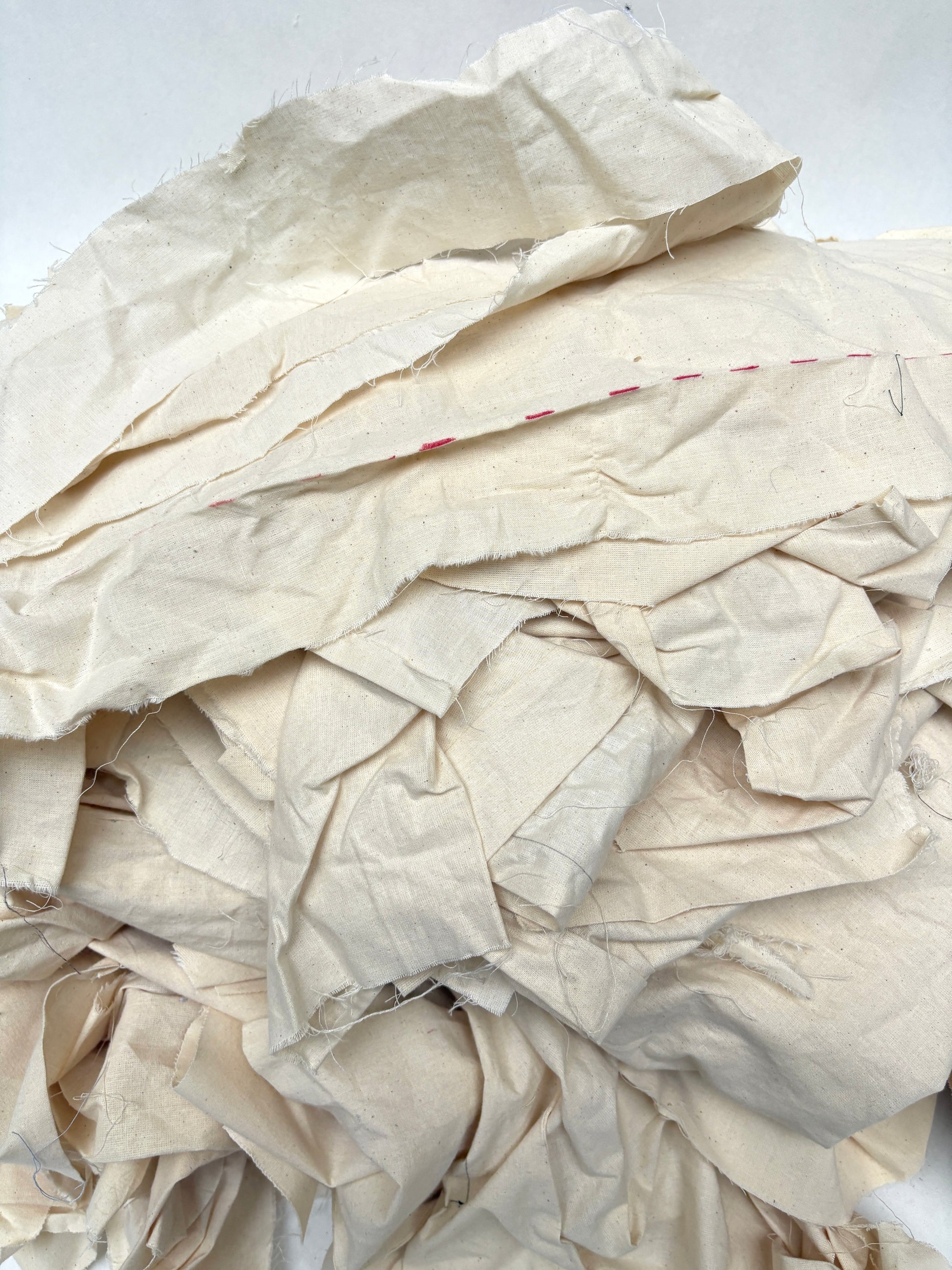 Stack of canvas offcuts fabric in white