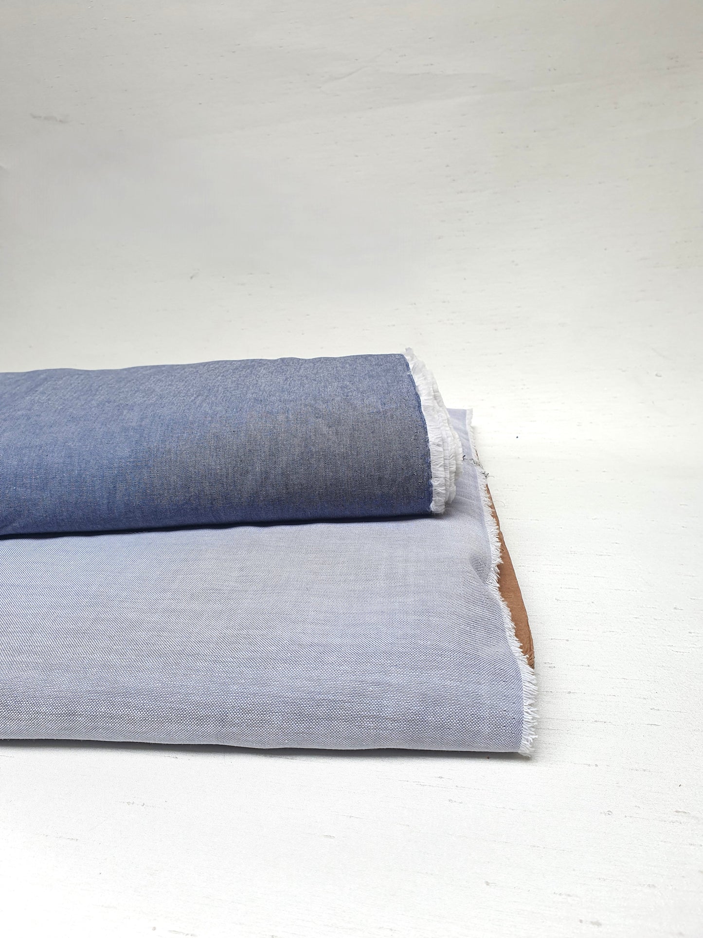Close-up of chambray cotton fabric in blue-grey 