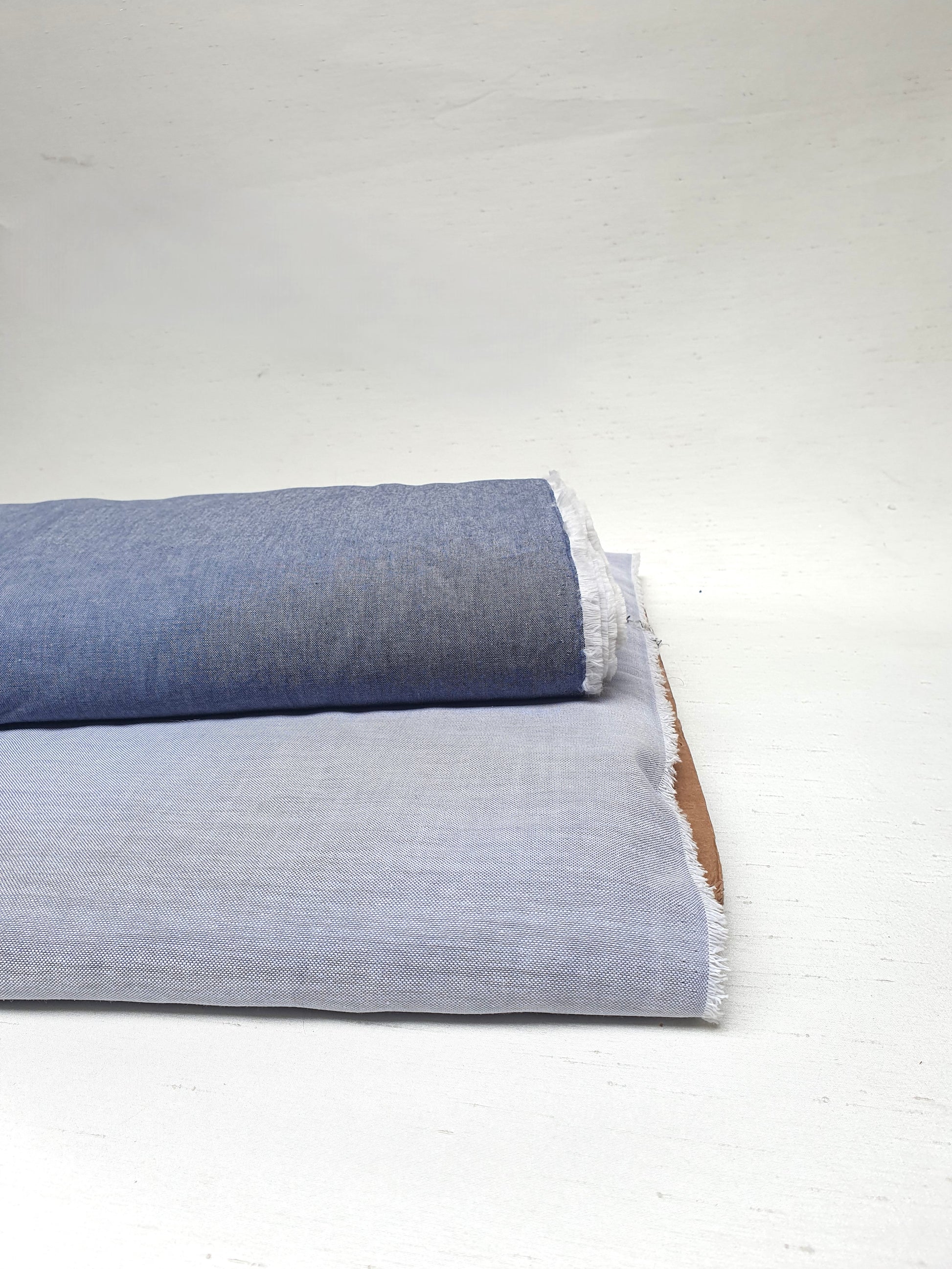 Close-up of chambray cotton fabric in blue-grey 