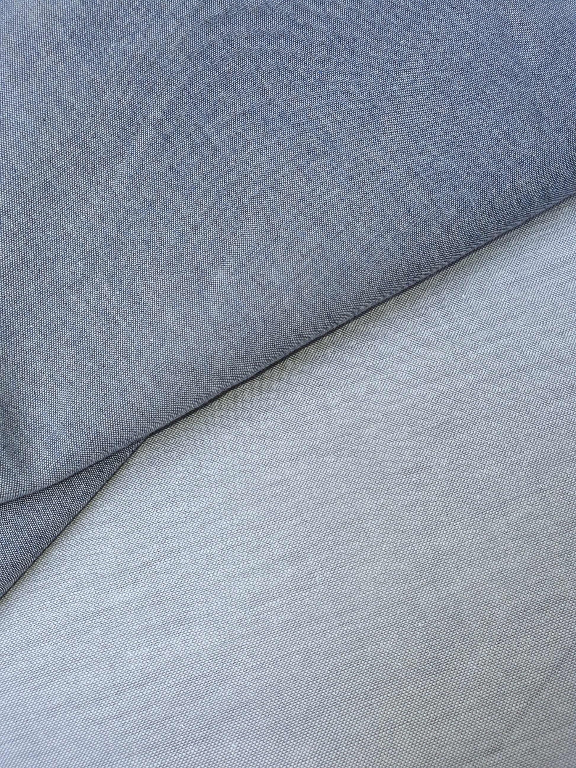 Close-up of chambray cotton fabric in blue-grey