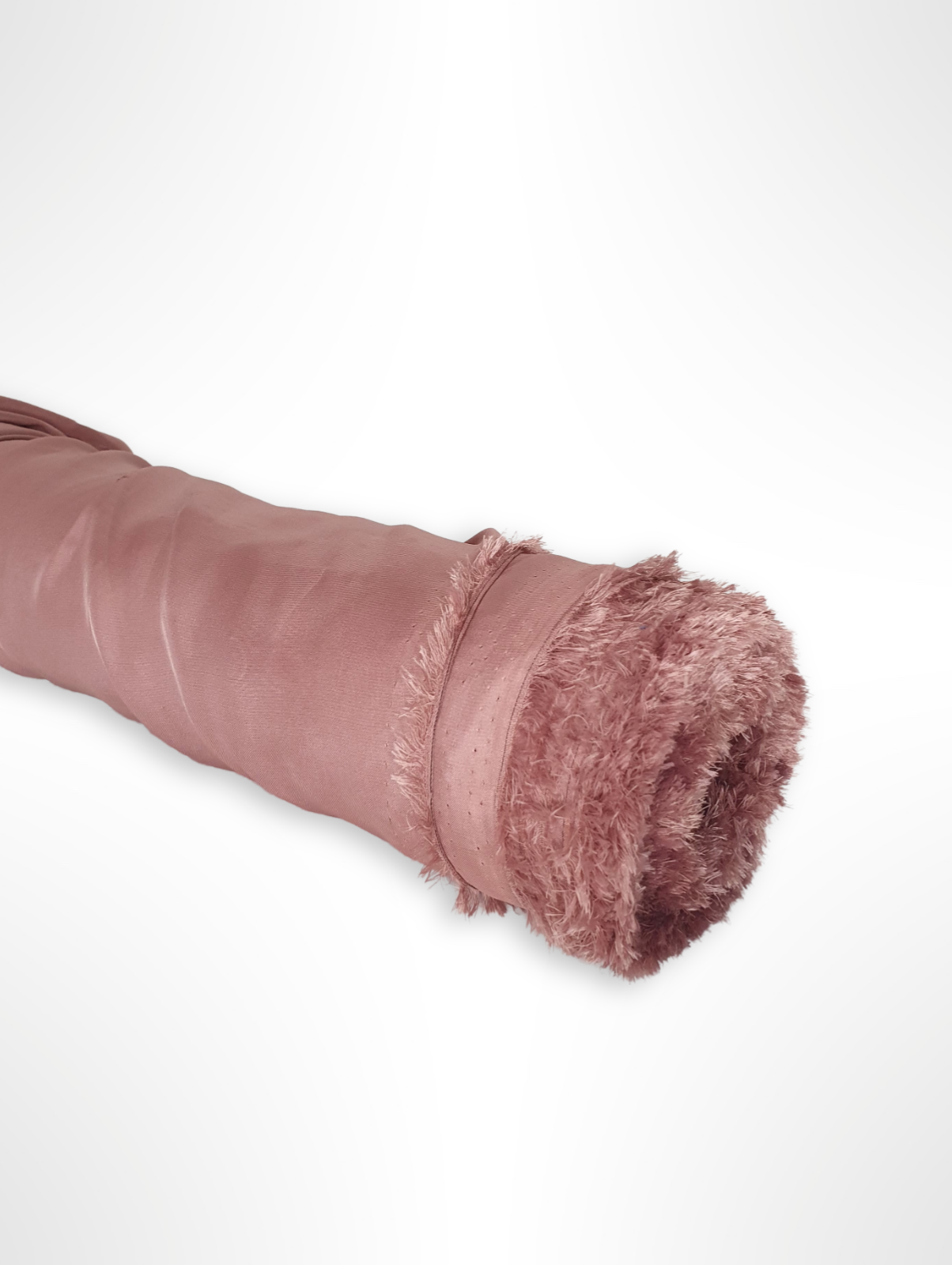 Roll of charmeuse fabric in pink, shiny texture visible 