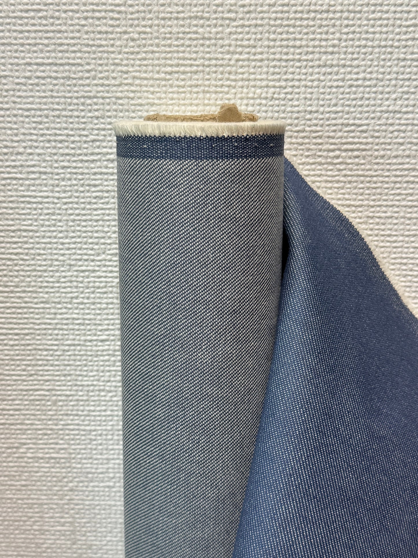 Roll of water repellent denim in light blue  