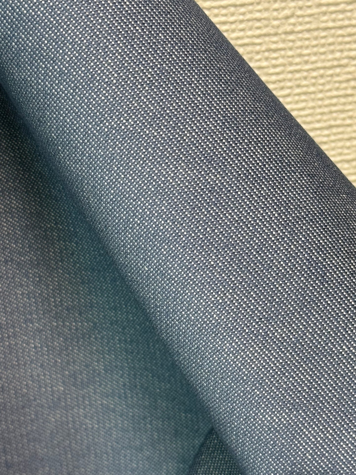 Close-up of water repellent denim in light blue  