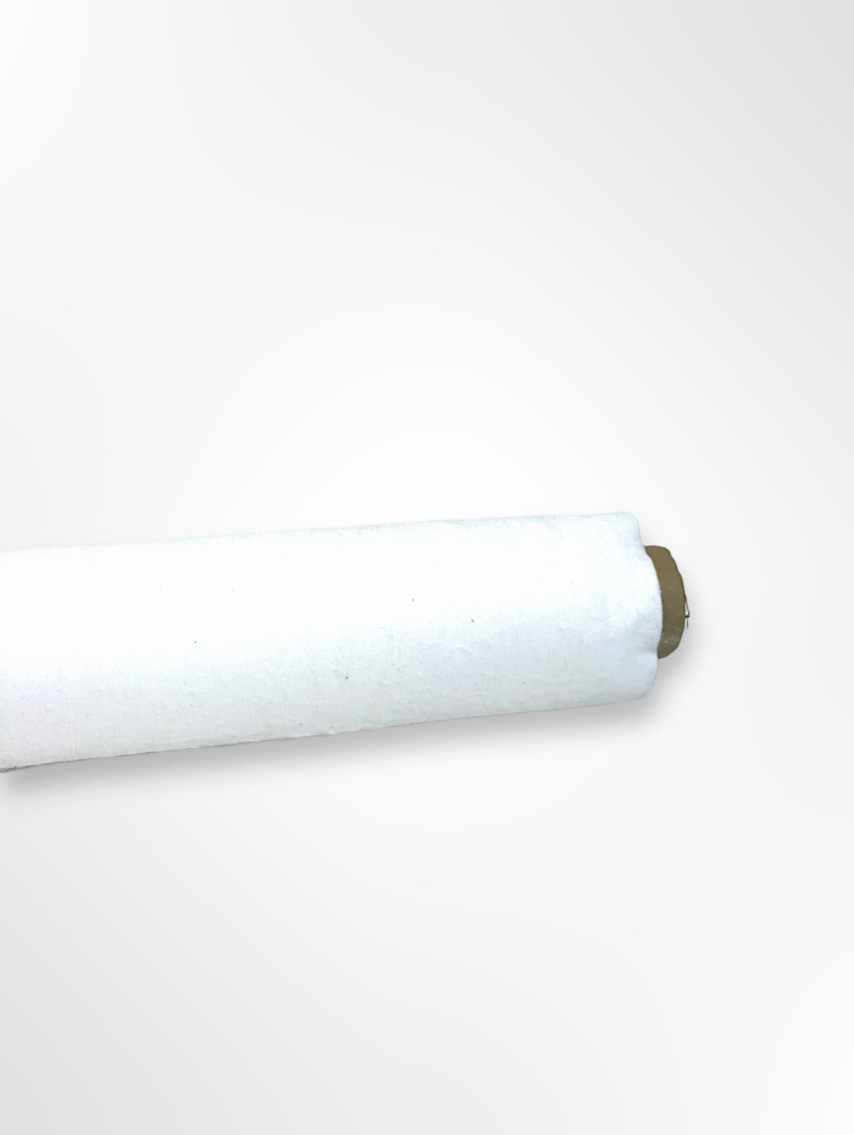 Roll of cellulosic felted fabric in white