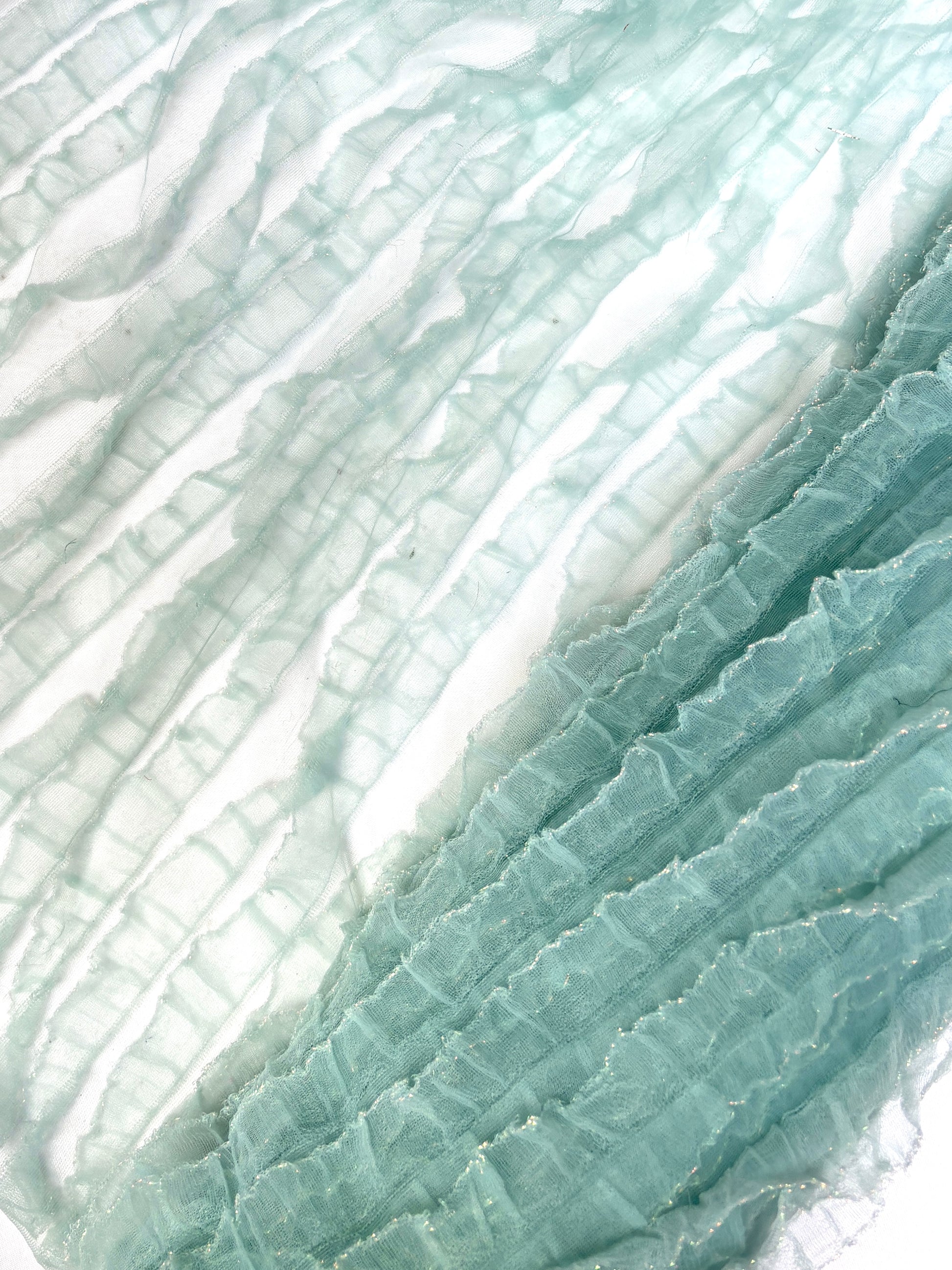 Translucent mesh flounce fabric in baby blue 