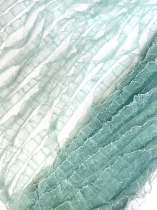 Translucent mesh flounce fabric in baby blue 