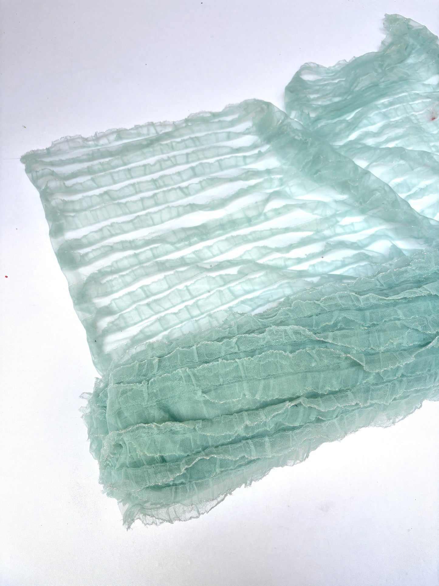 Translucent mesh flounce fabric in baby blue 