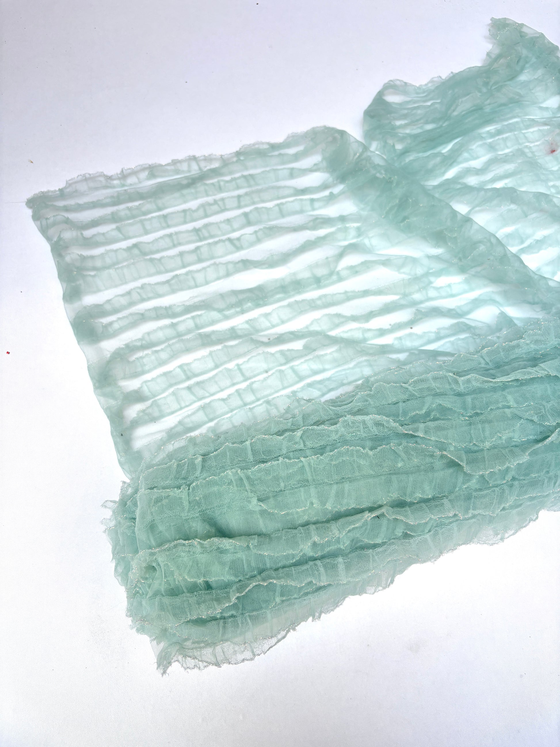 Translucent mesh flounce fabric in baby blue 