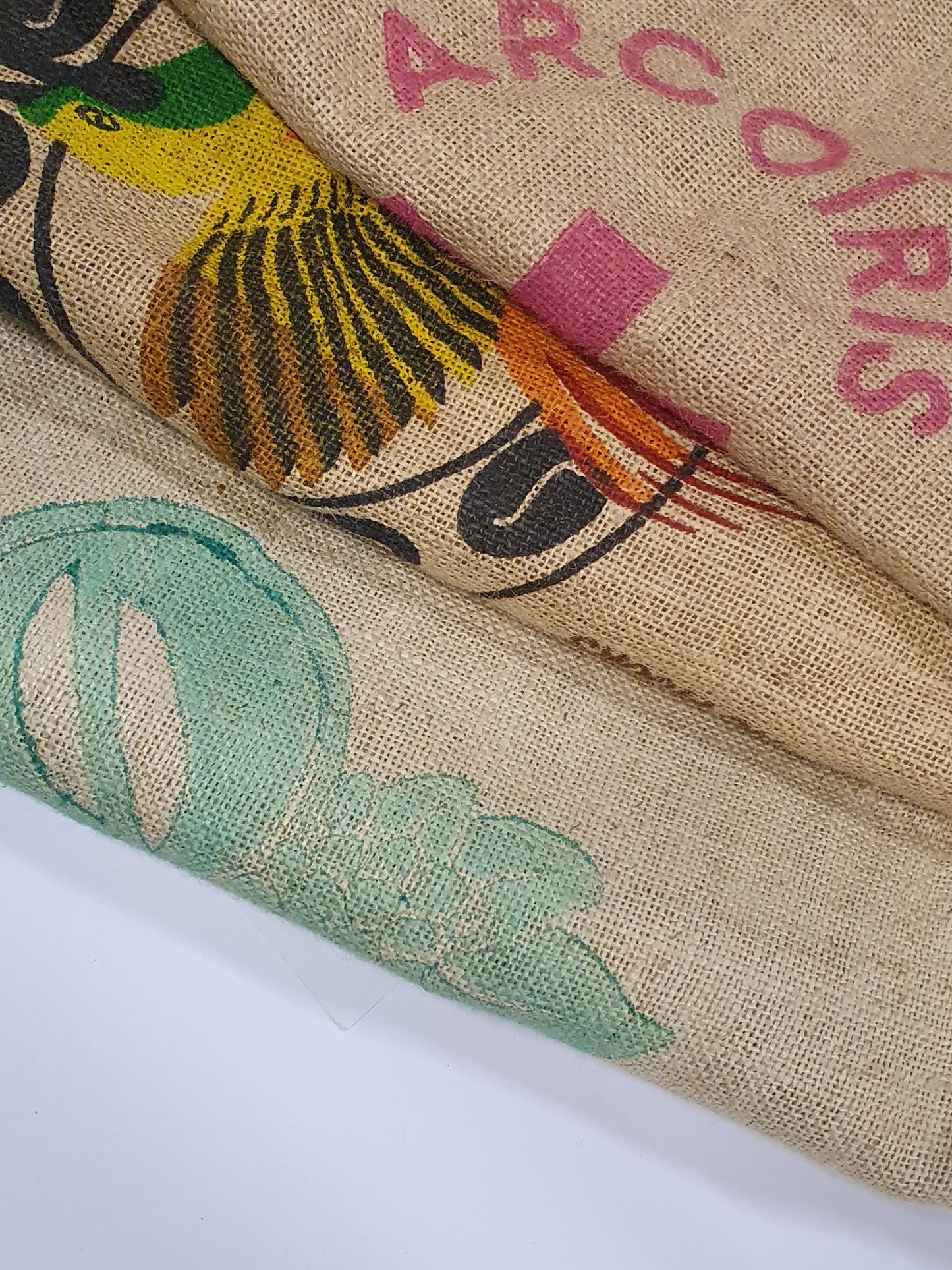 Close-up of hessian fabric coffee jute sacks with printed on words and pictures