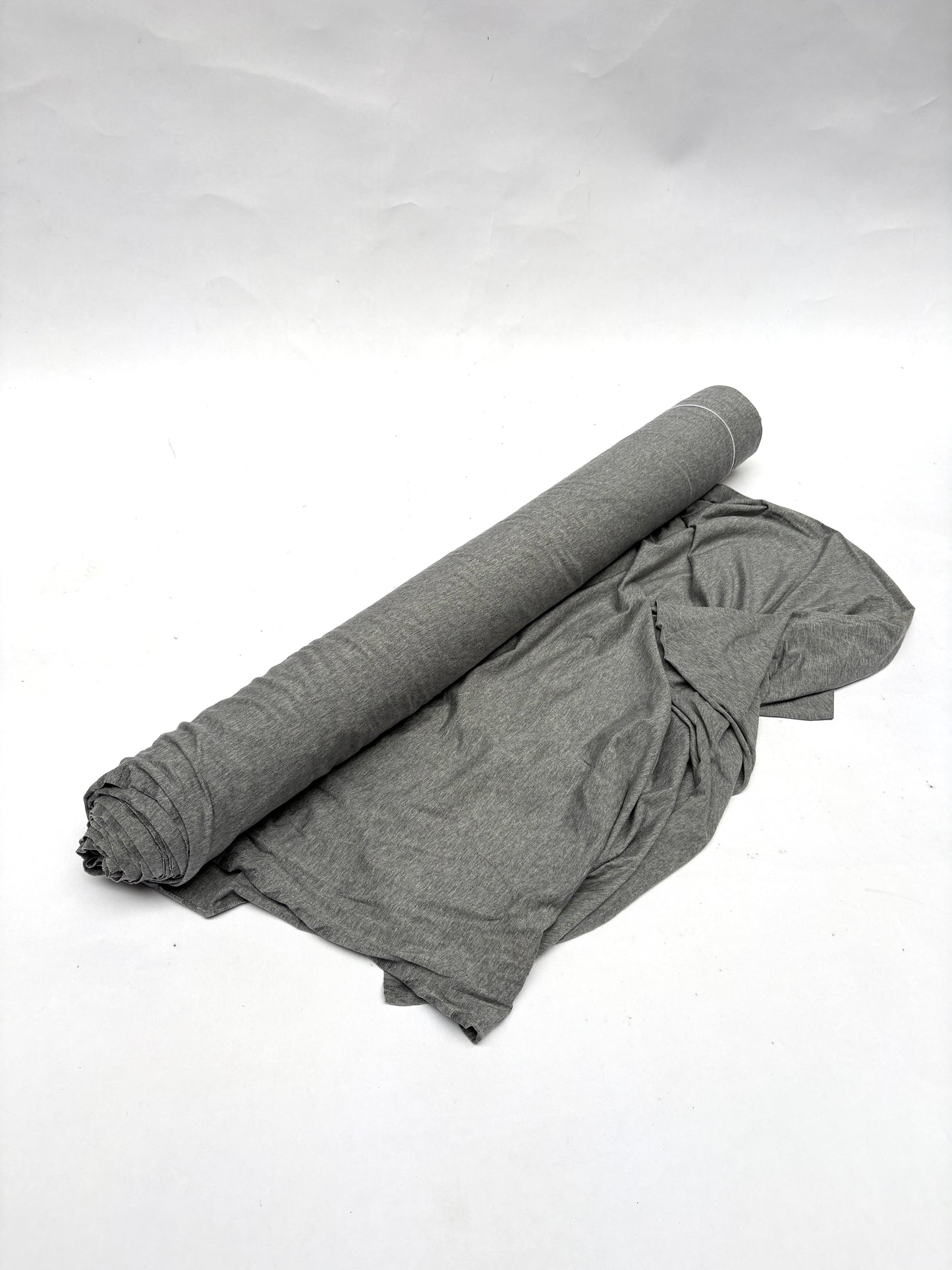 Roll of light weighted jersey fabric in grey 