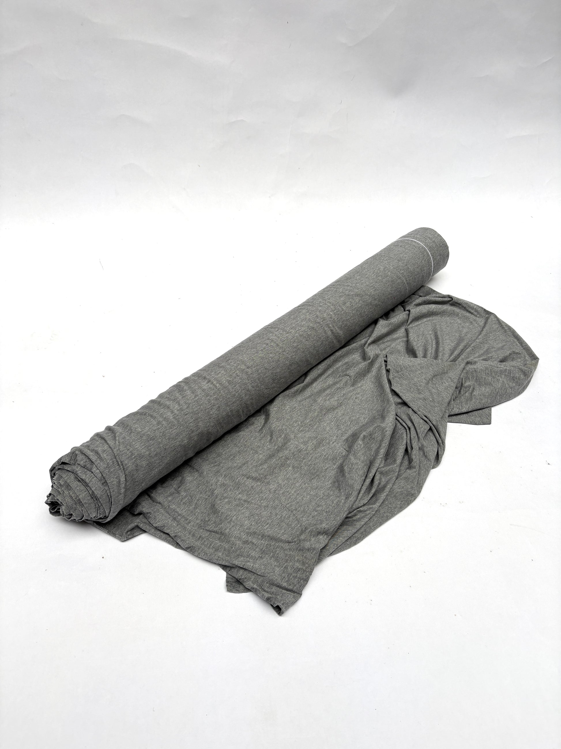 Roll of light weighted jersey fabric in grey 