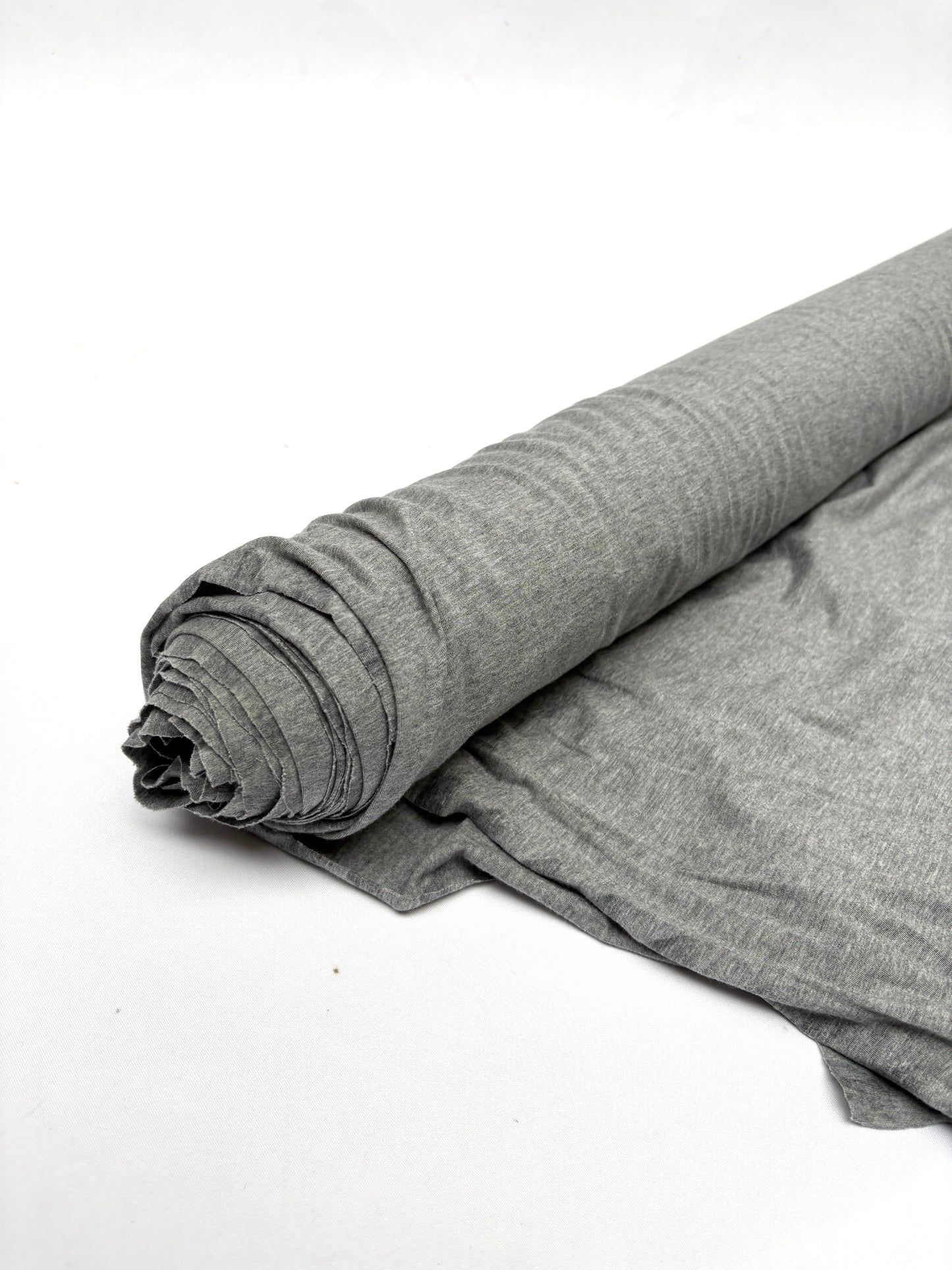 Roll of light weighted jersey fabric in grey 