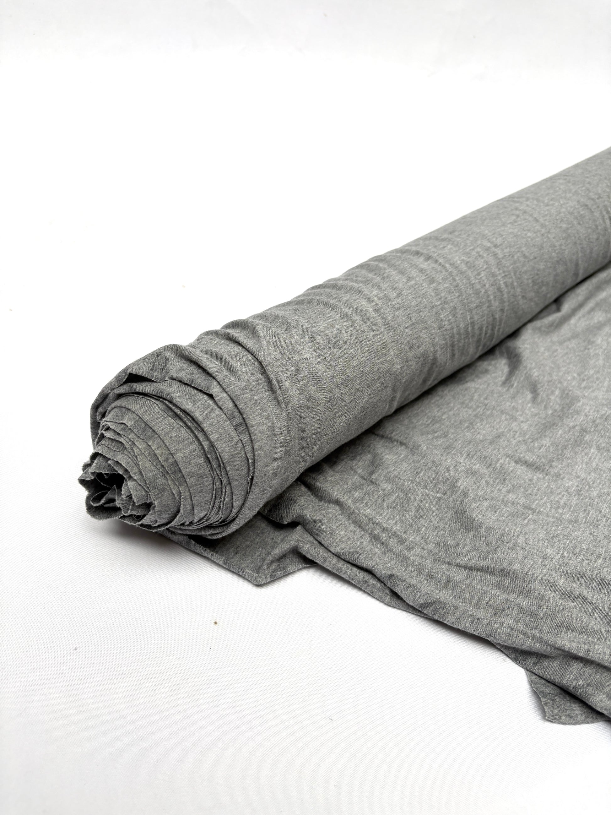 Roll of light weighted jersey fabric in grey 