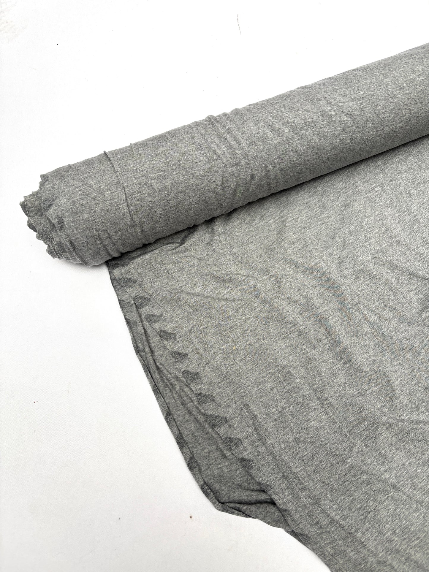Roll of light weighted jersey fabric in grey 