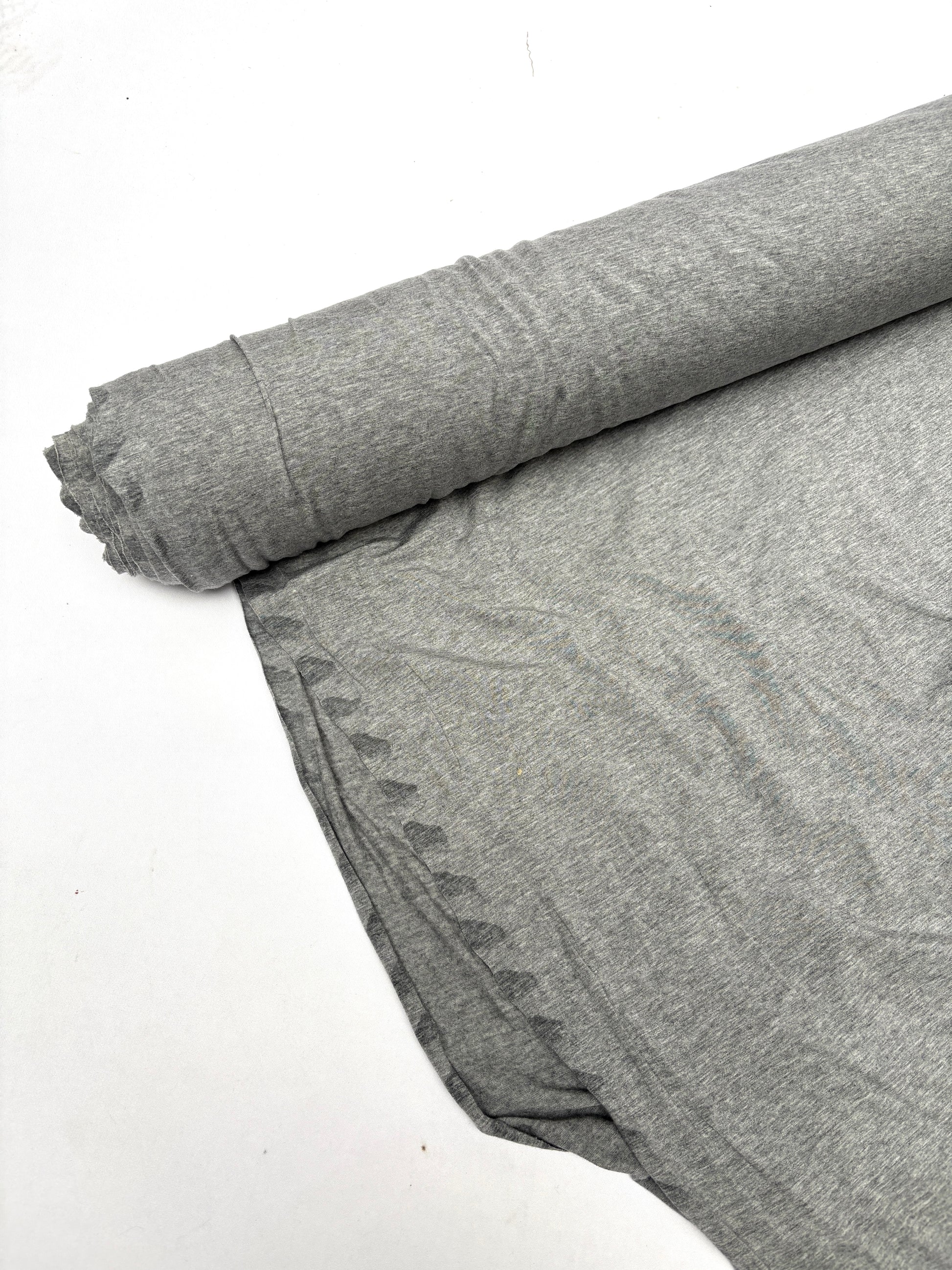 Roll of light weighted jersey fabric in grey 