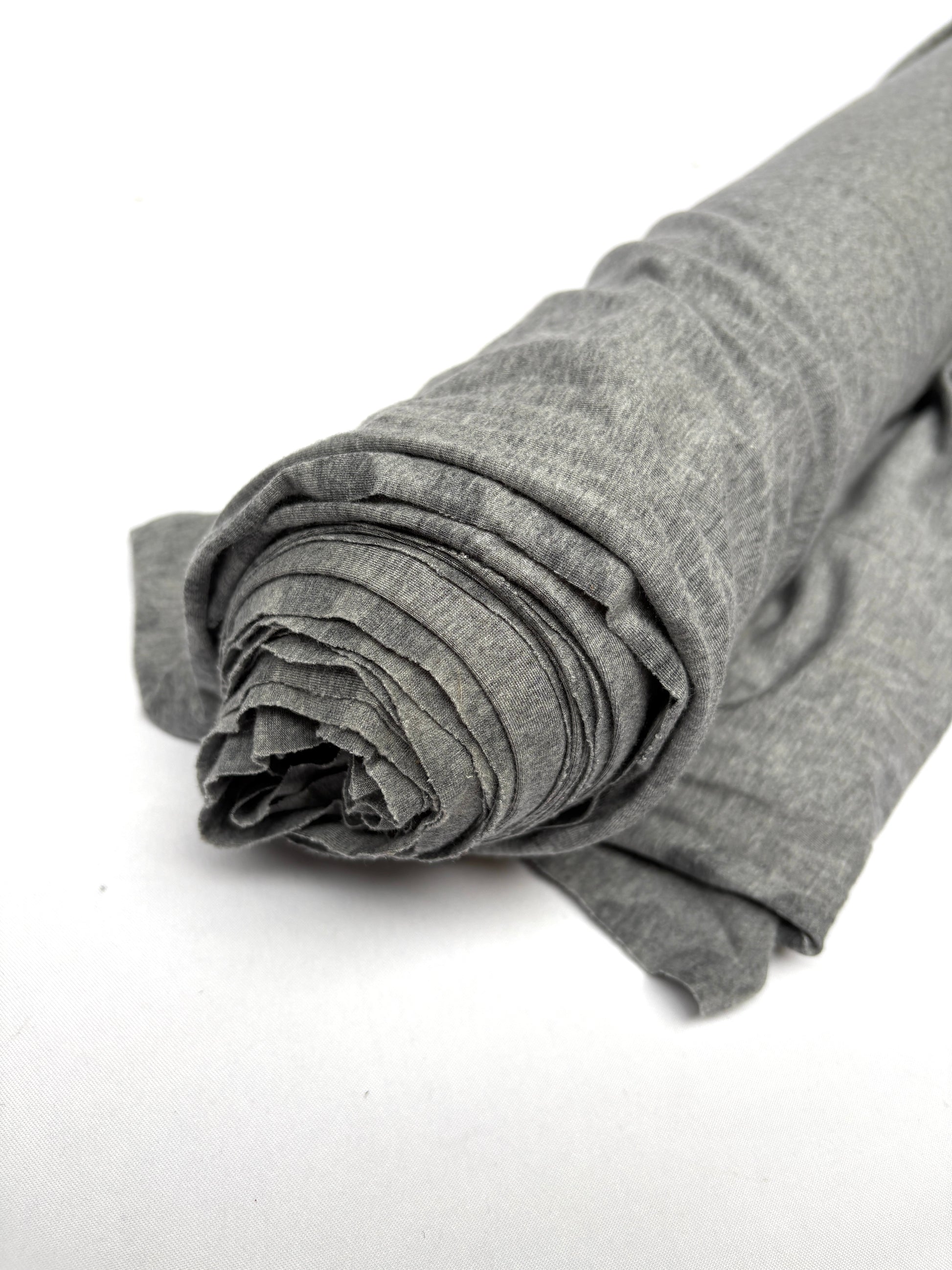 Roll of light weighted jersey fabric in grey 