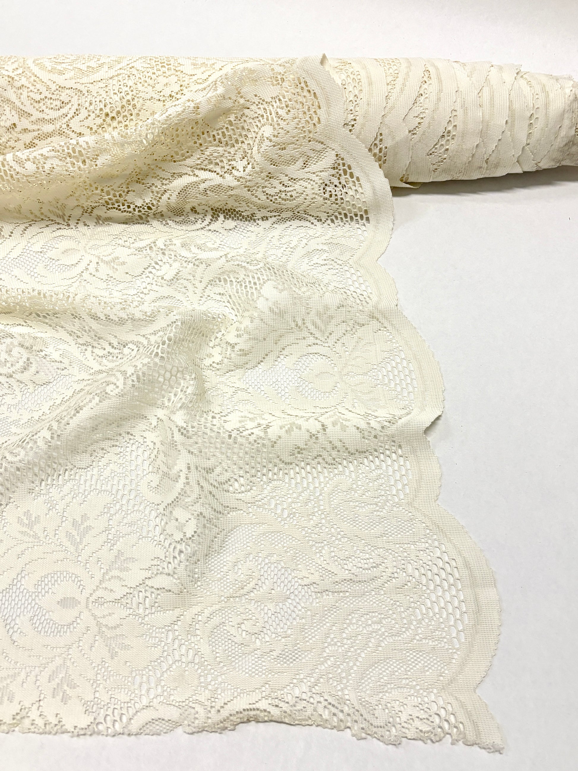 Close-up of lace fabric in cream white 