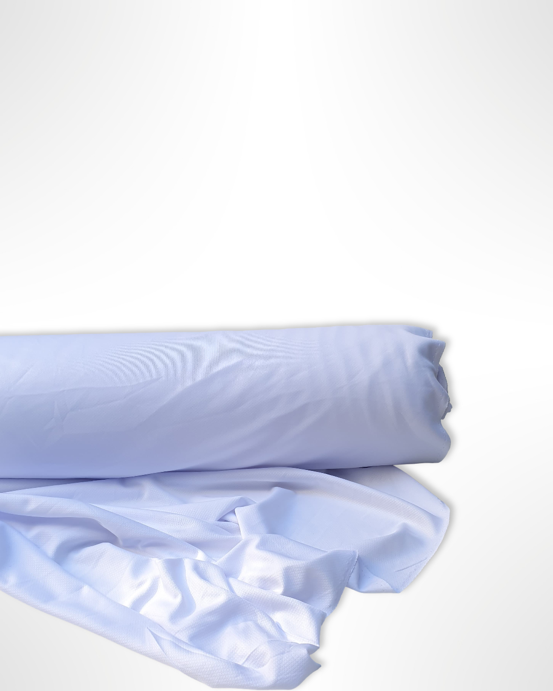 Roll of jersey light weight fabric in white, soft texture visible 