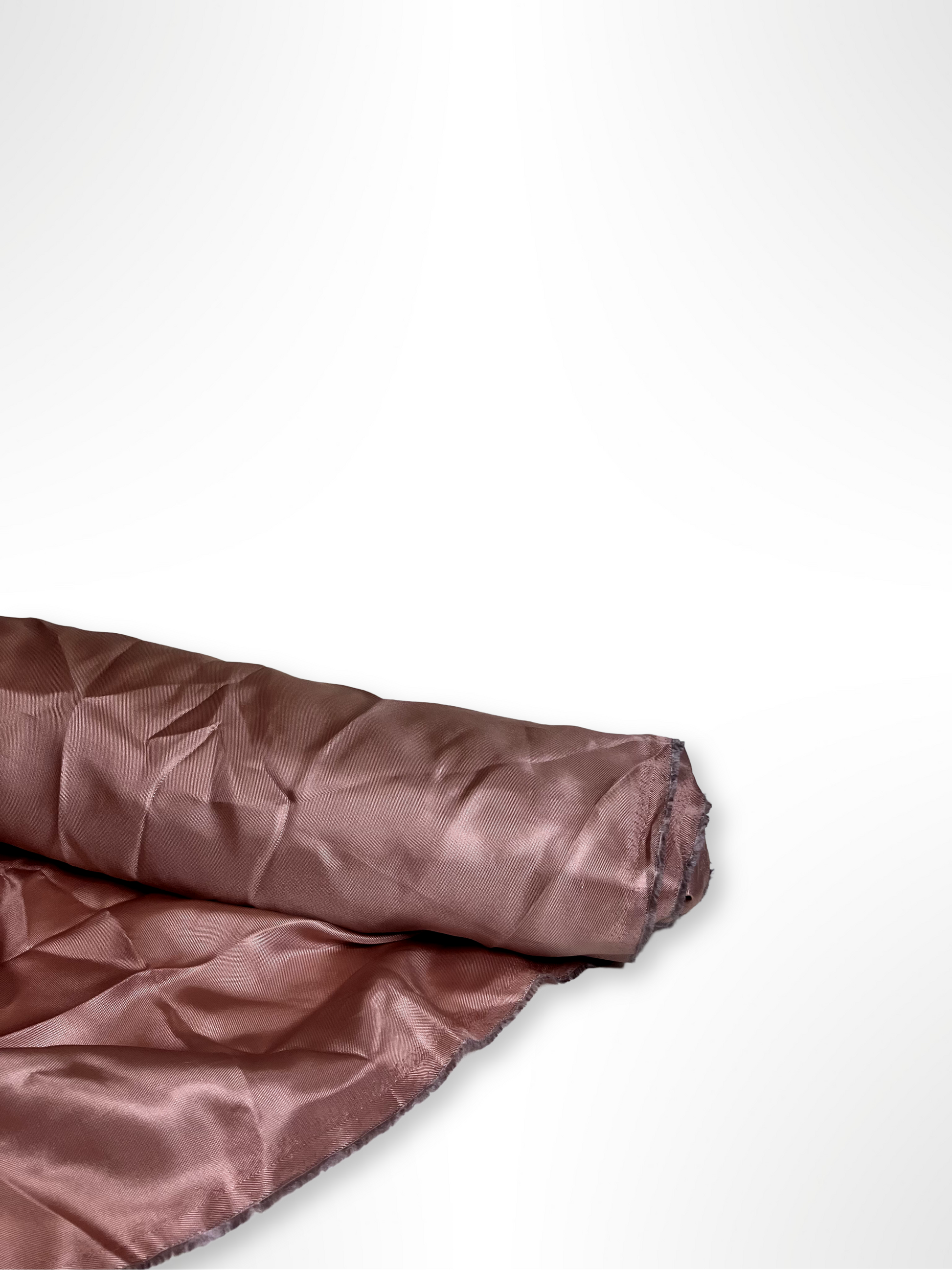 Roll of satin twill fabric in pink