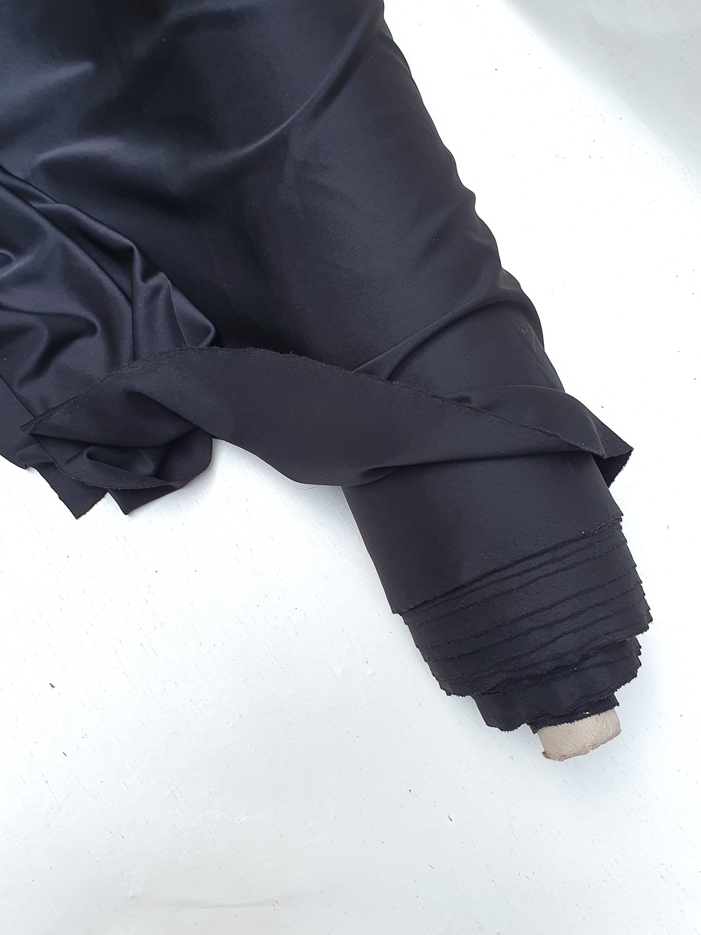 Roll of lycra spandex fabric in black 